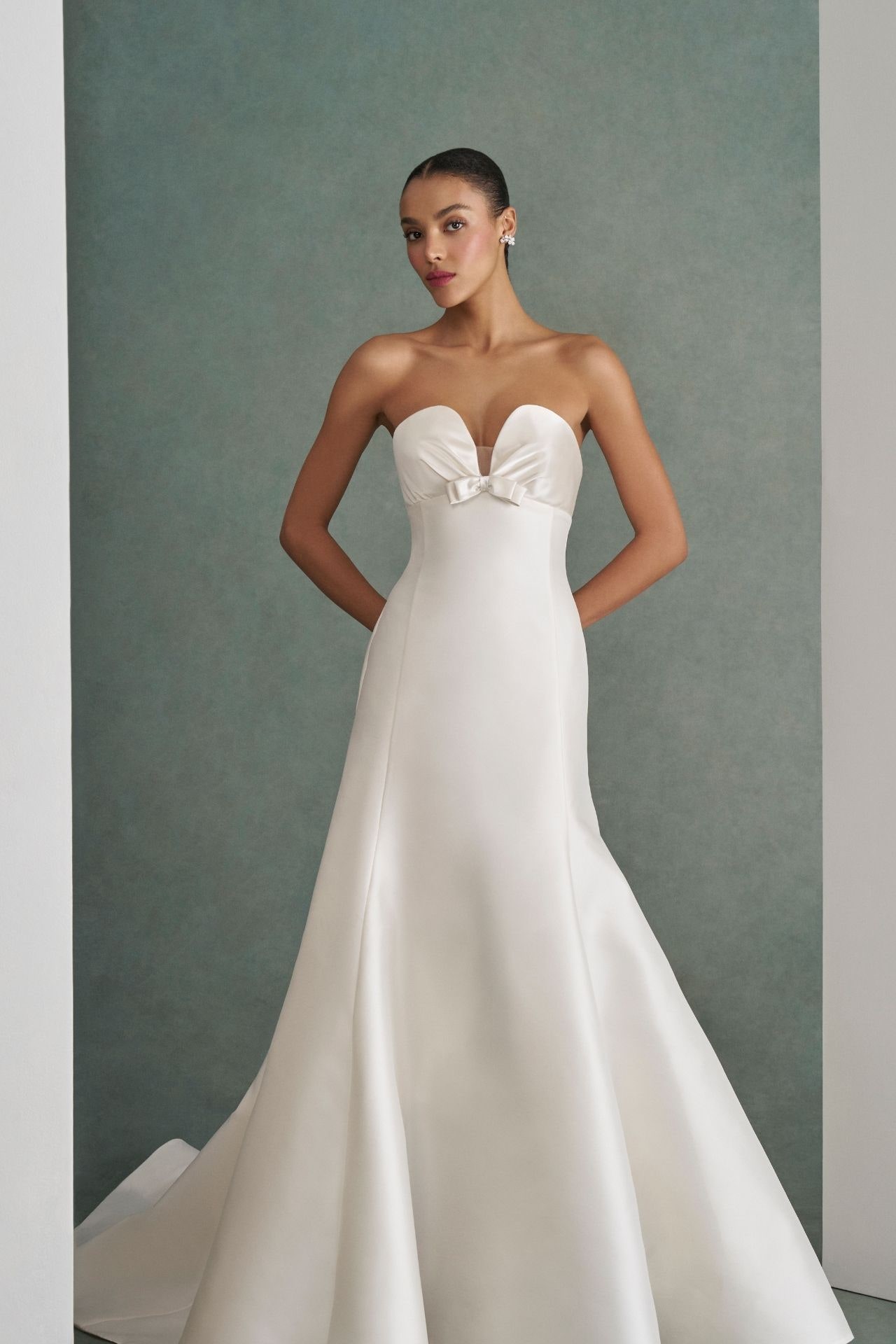 Images may contain Peppe Lanzetta clothing dress fashion formal wear dress wedding dress adult and man