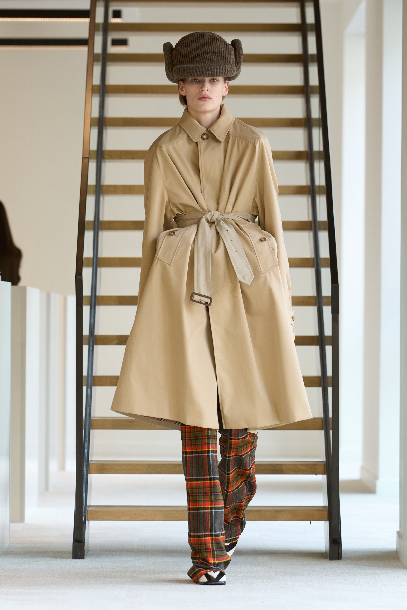 Images may contain clothes, coats and people