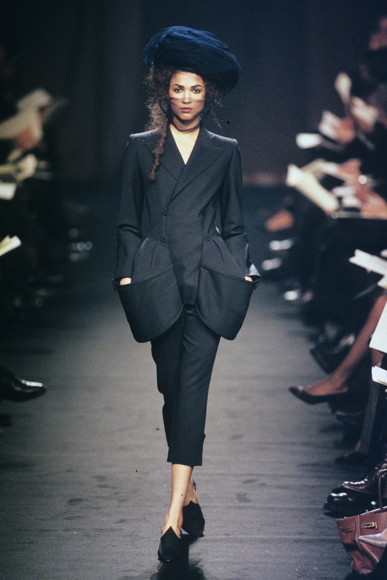 Images may contain large coats, clothing, clothing suits, people, shoes and women
