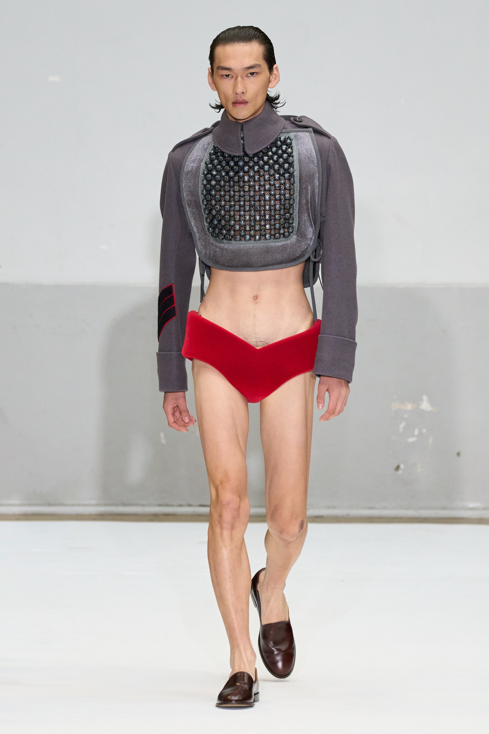 Images may contain adult clothing underwear long sleeves and sleeves