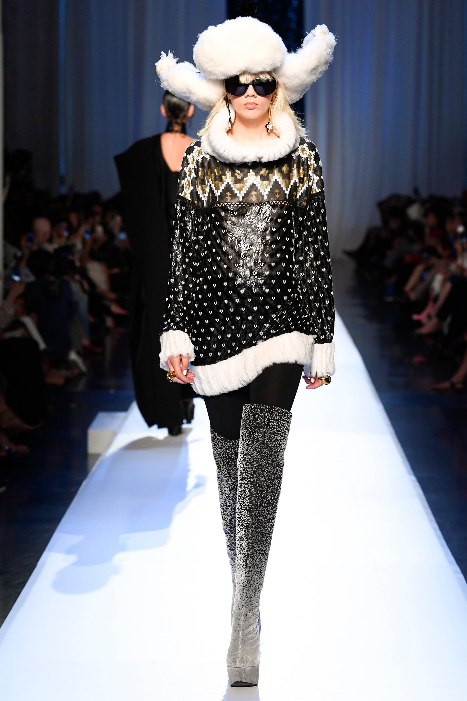 Images may contain runway fashion sunglasses accessories people and people