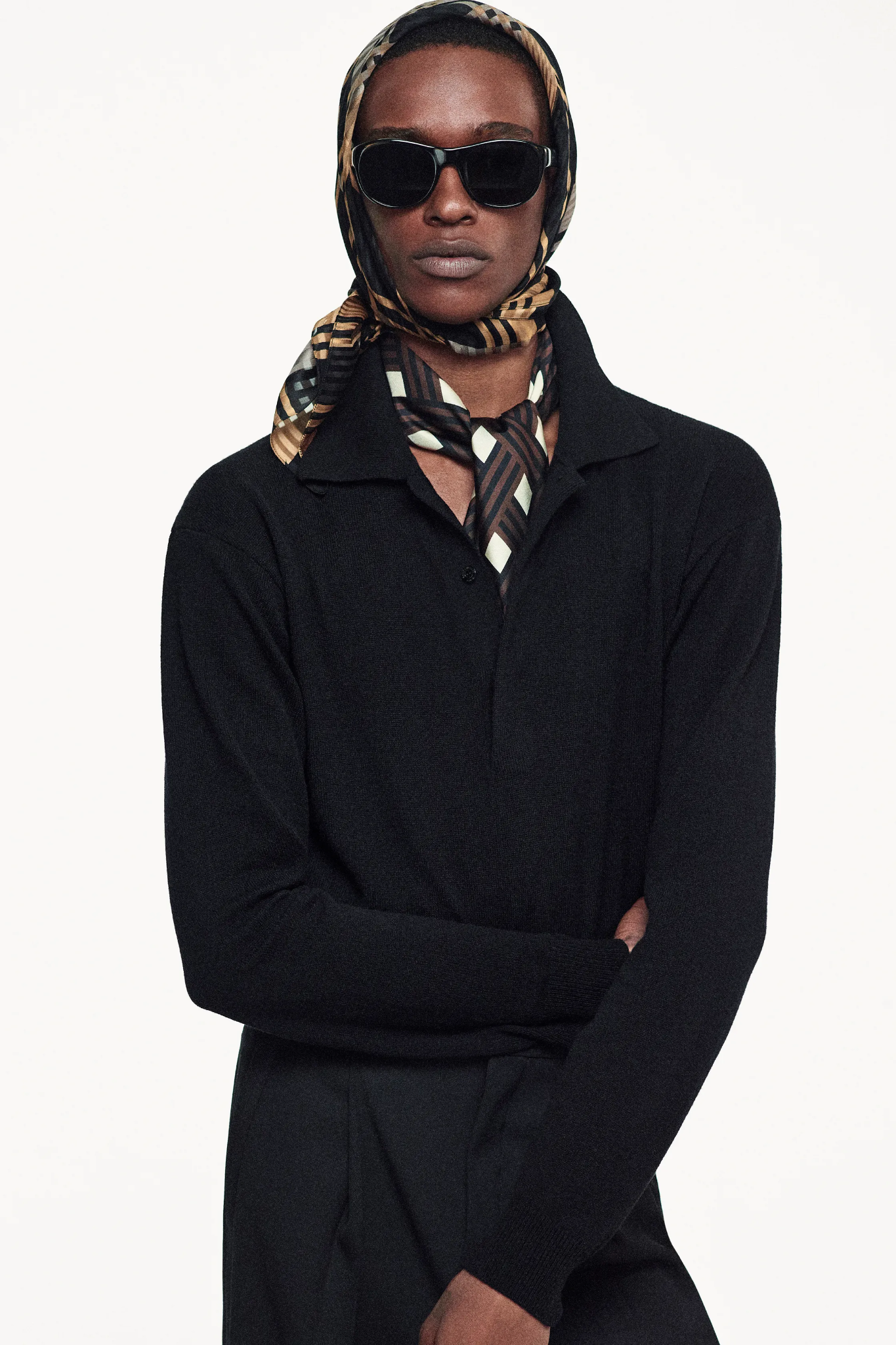 Images may contain clothes, long sleeves, jacket accessories, sunglasses, adult face and photography