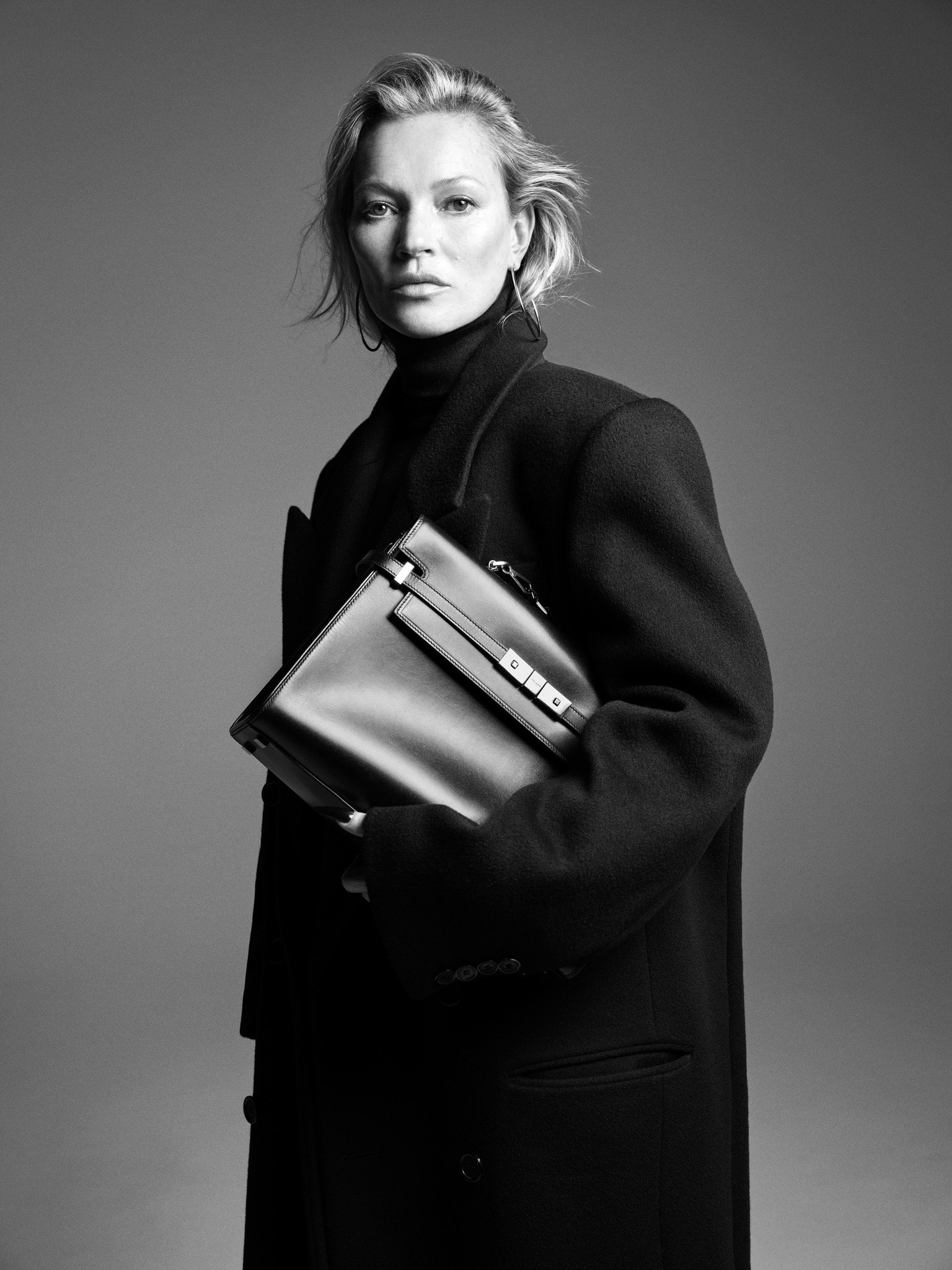 Images may contain Kate Moss Accessories Bag Handbag Adult Clothing Jacket Style Face and Photography