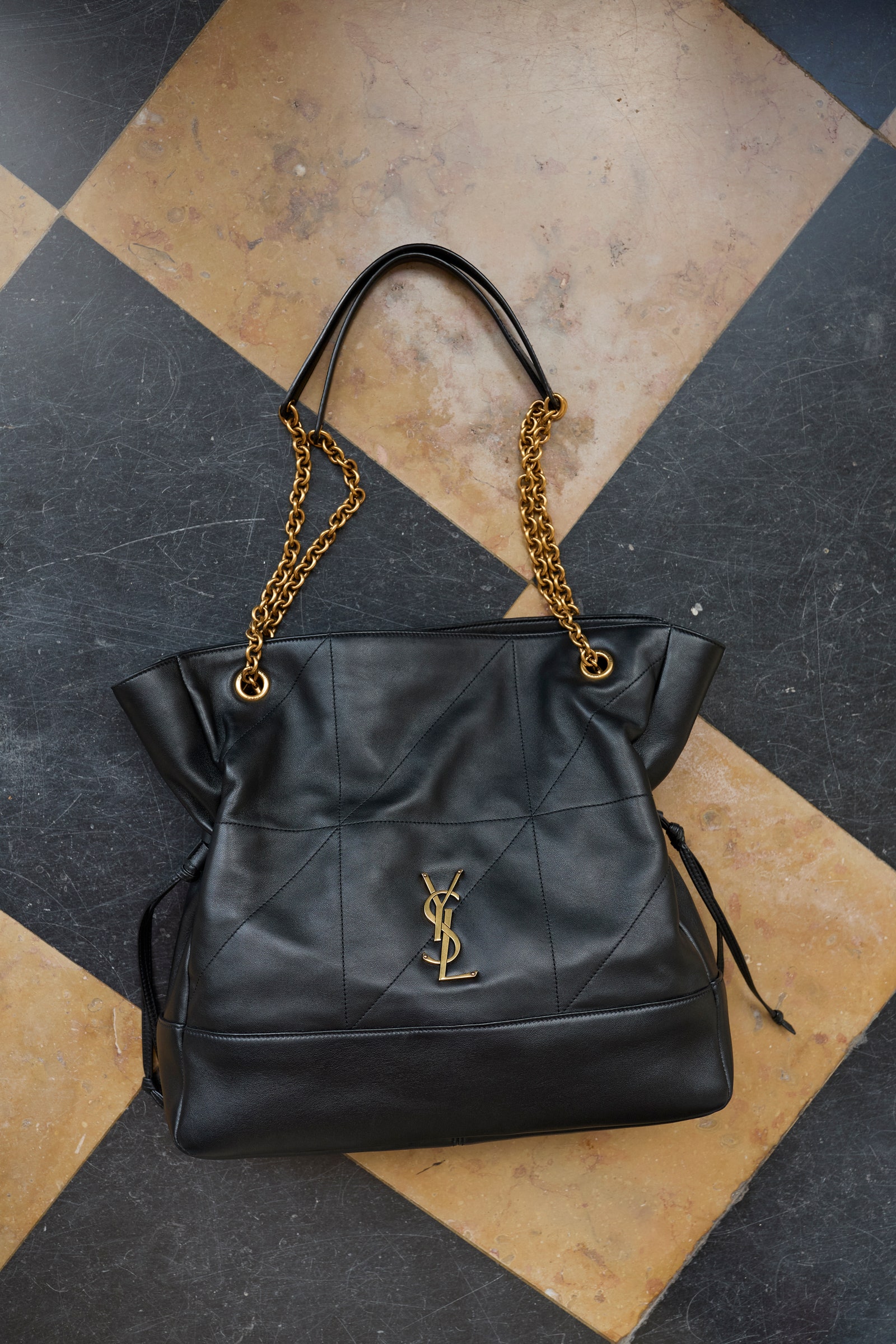 Images may contain accessories for handbags and wallets