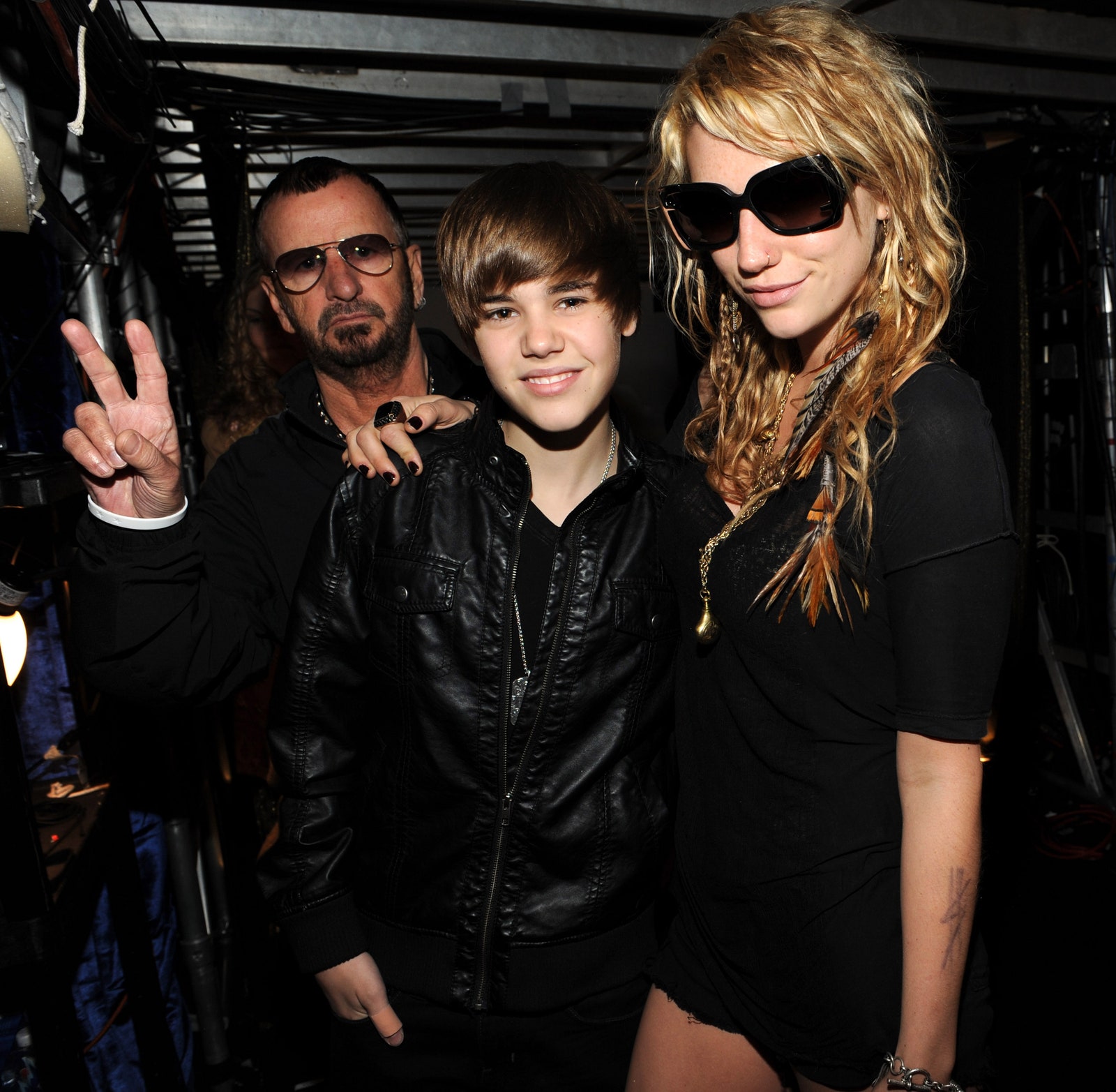 Images may contain Kesha Justin Bieber Ringo Starr Clothing Jacket Accessories Glasses Jewelry Rings and Adults