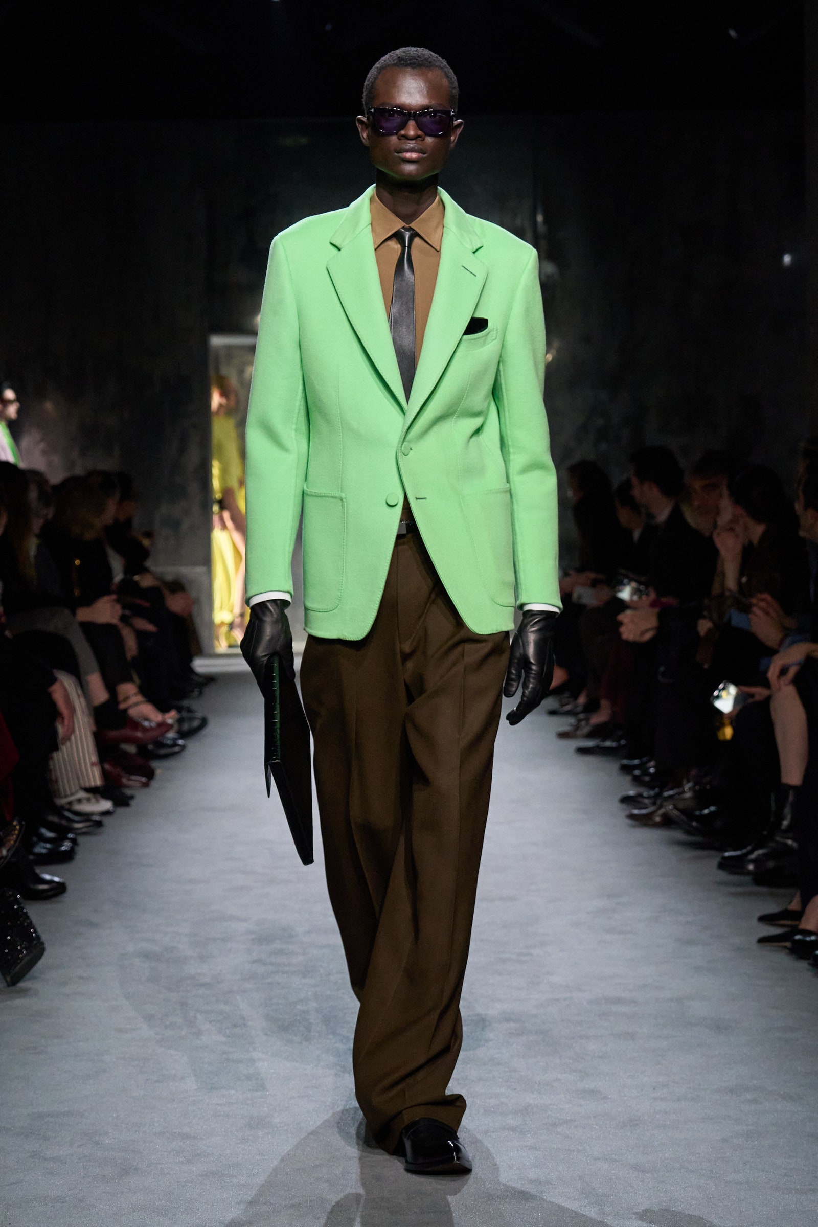 Images may contain clothing gloves formally wearing suits fashion people standing accessories tie glass and adult