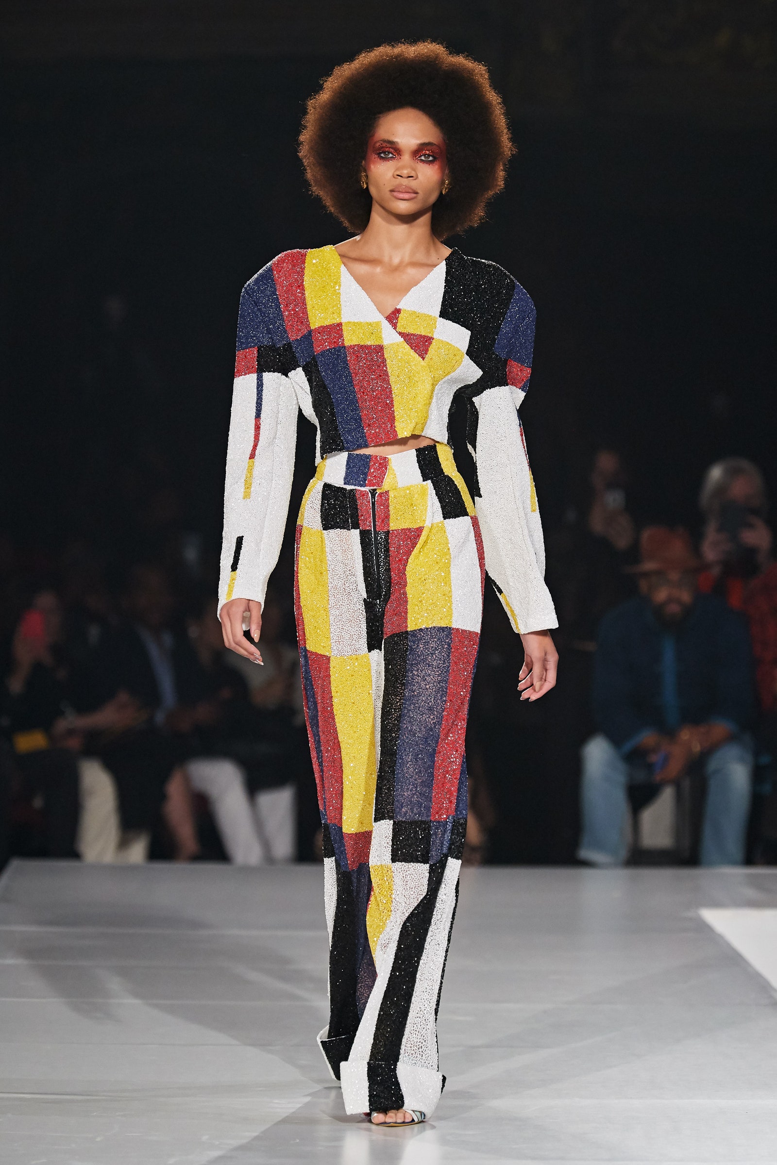 This image may contain clothing clothing people shoes runway fashion jacket jacket and sleeves