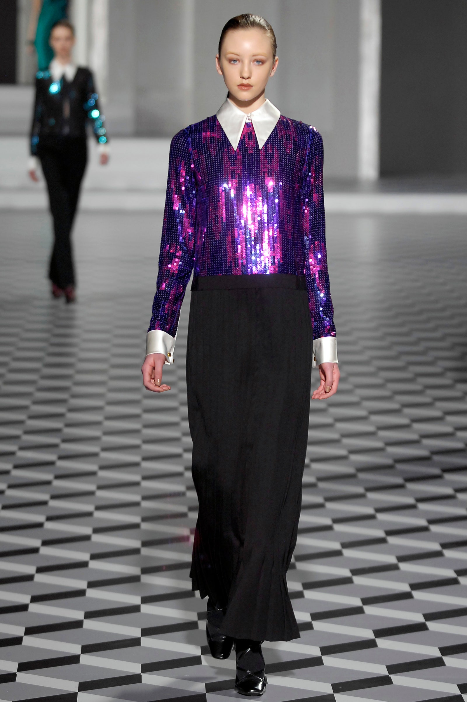 Images may contain standing stylish long-sleeved sleeves and gloves for adults formally wearing clothing