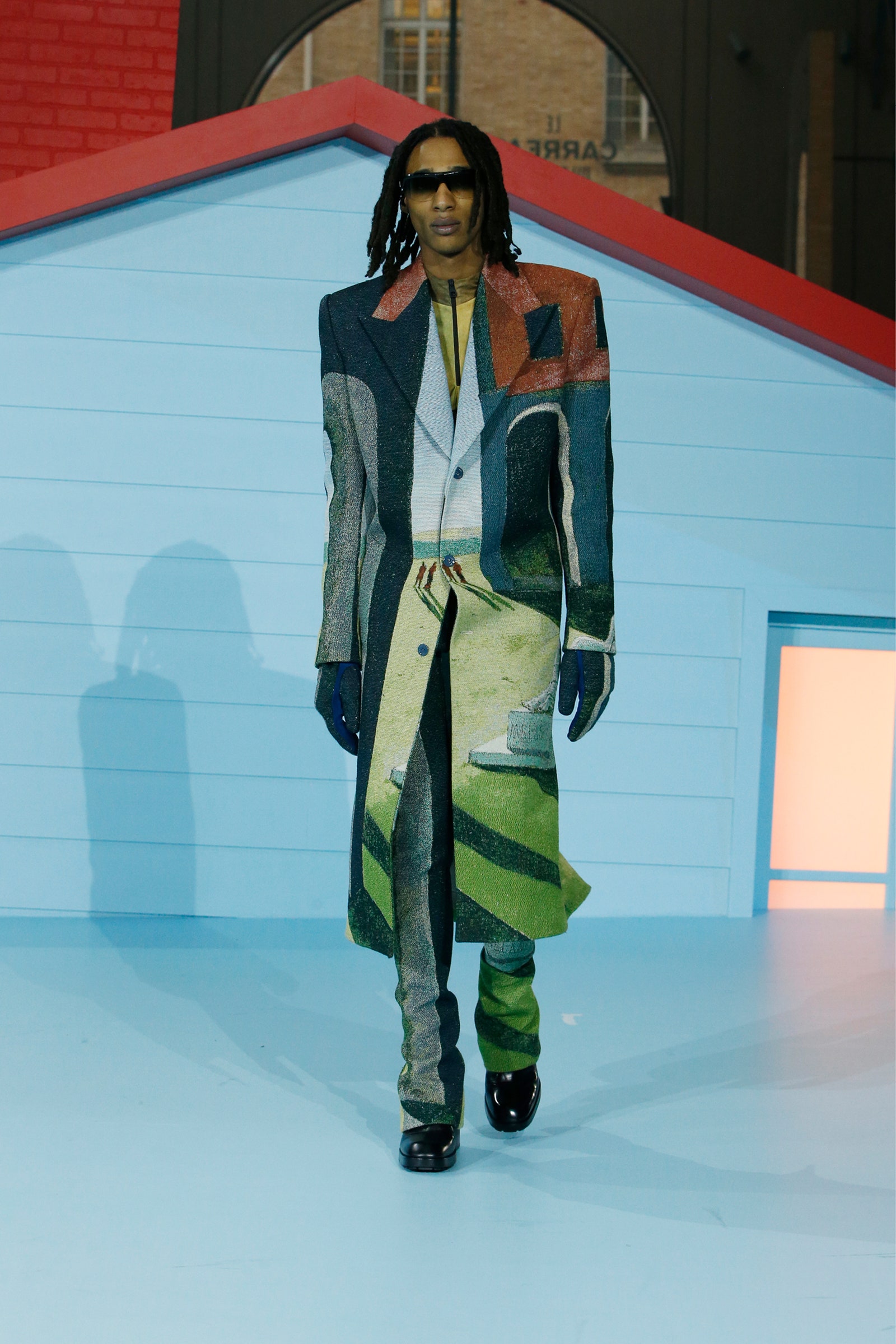 Images may contain clothing clothing sleeves sunglasses accessories human fashion jackets and coats