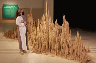 A woman visits Diriyah Contemporary Art Biennale in JAX district, northwest of Riyadh, Saudi Arabia, Dec. 11, 2021.  Diriyah Contemporary Art Biennale was opened to the public on Saturday. (Photo by Wang Haizhou/Xinhua via Getty Images)