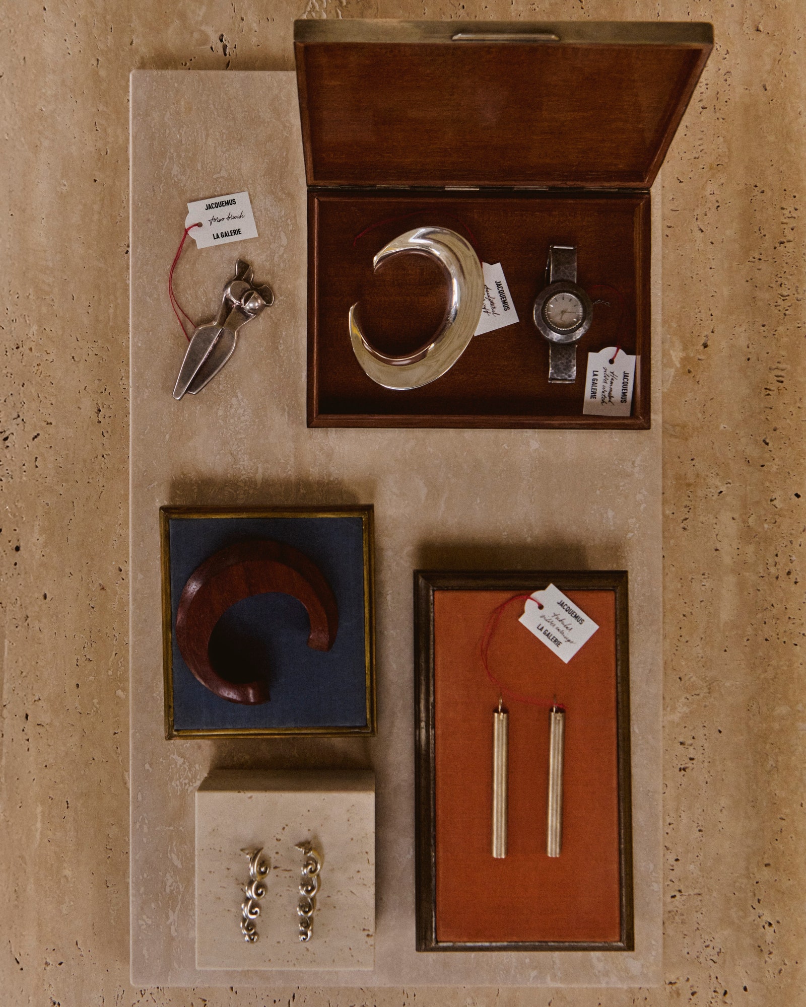 Images may contain cabinet furniture scissors art painting candles and tableware