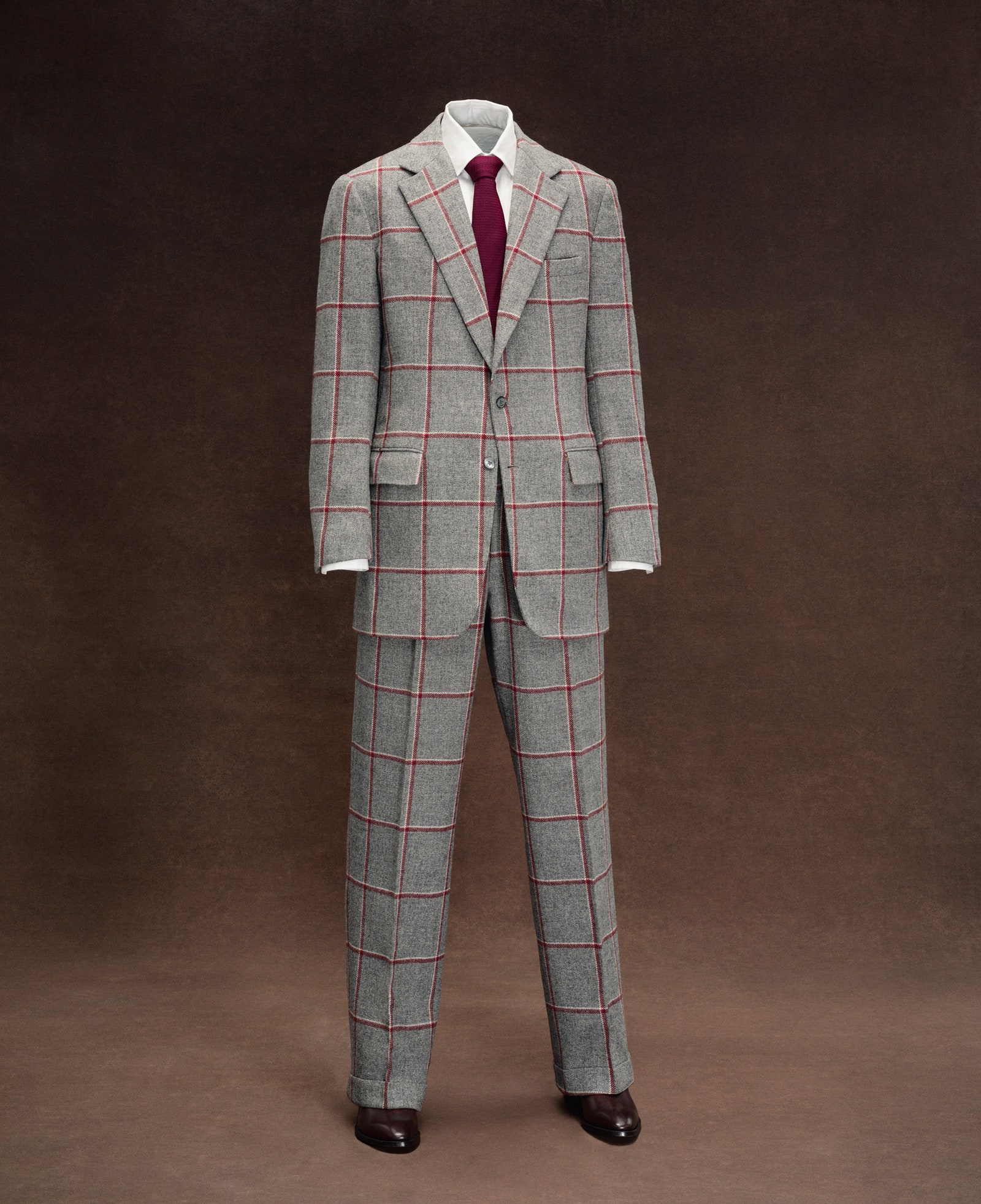 Images may contain pajamas and tuxedoes in formal clothing