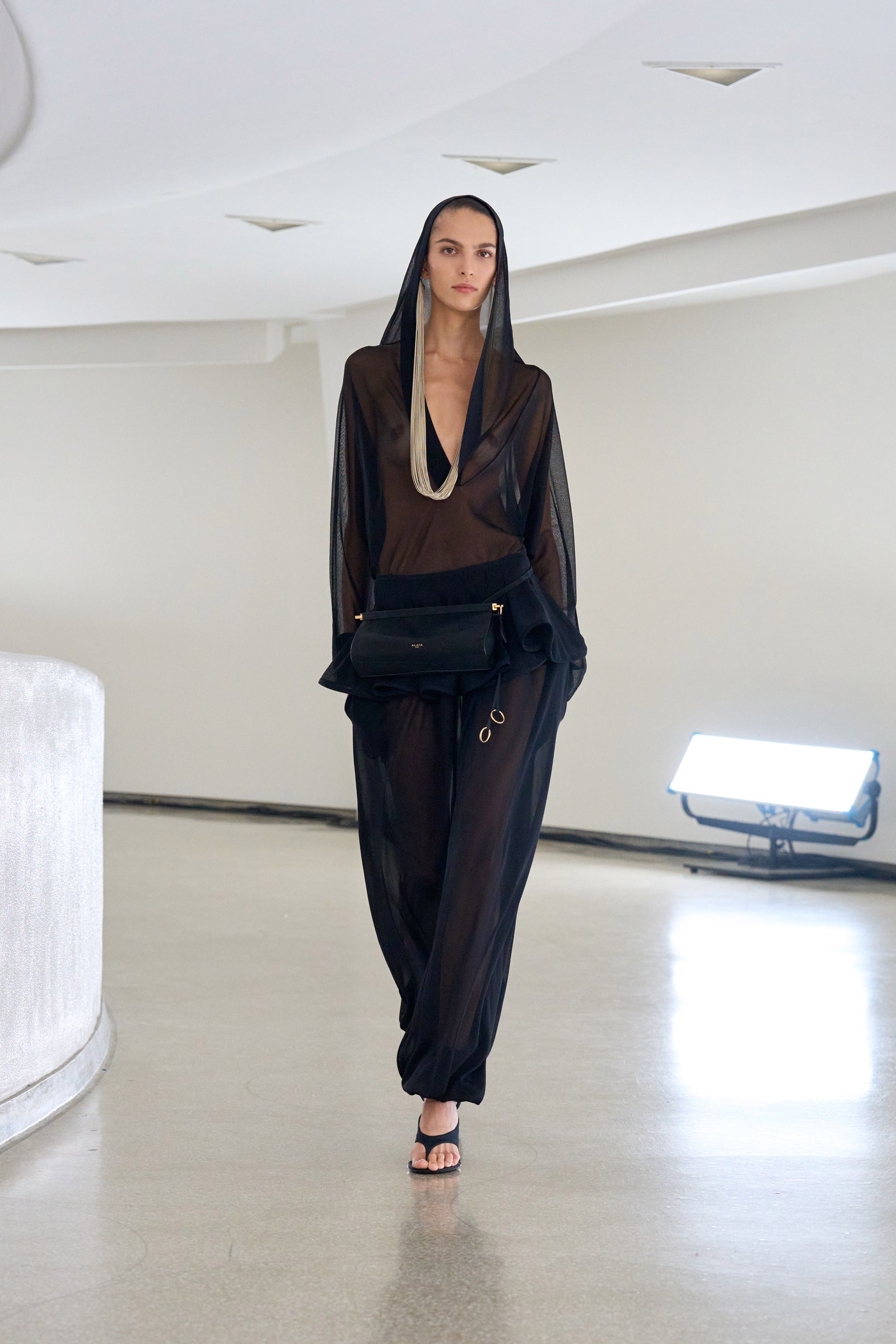 Images may contain adult clothing formally wearing suits long sleeve jackets and shoes