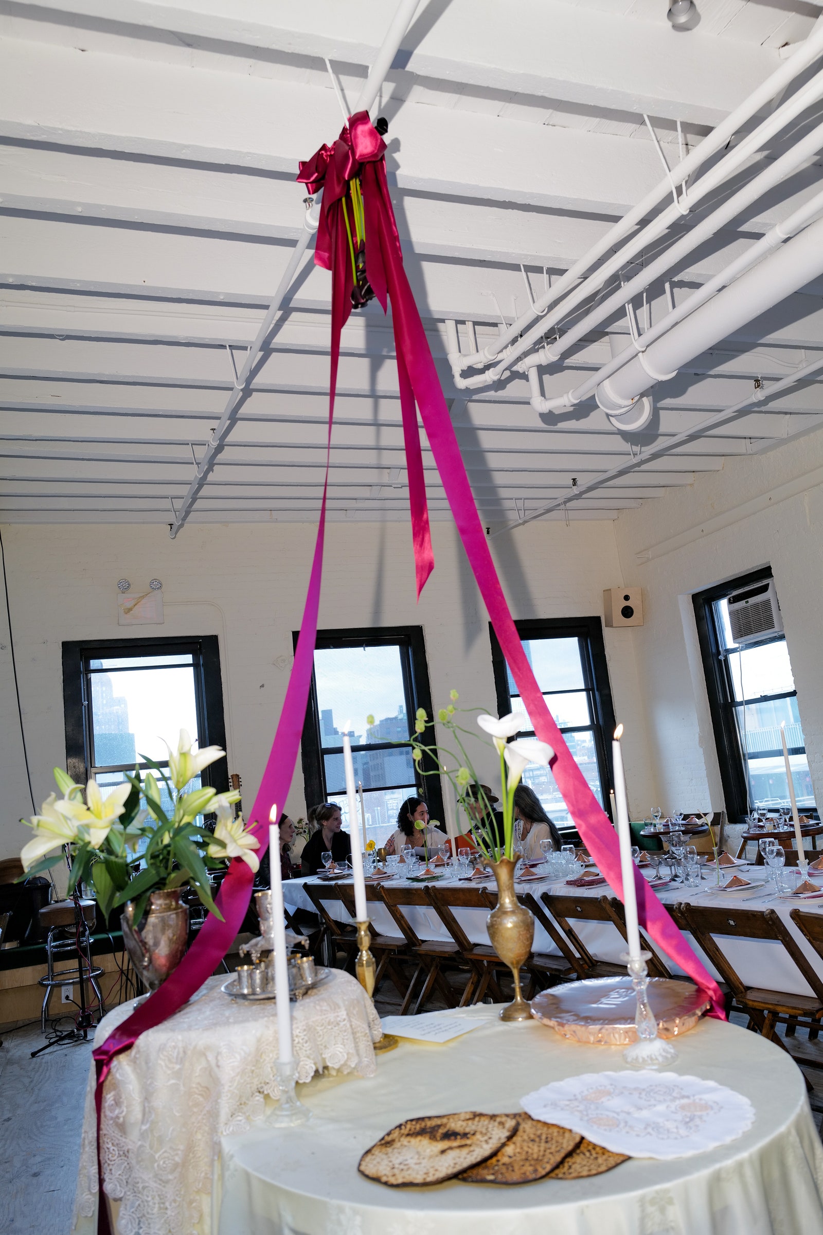 Images may contain floral arrangements plants dining table furniture table pot plants and architecture