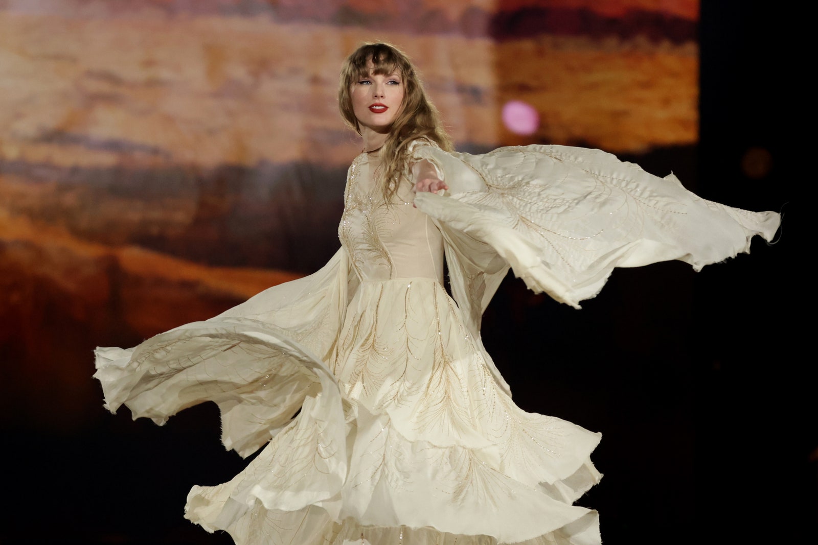 Images may contain Taylor Swift clothing stylish adult wedding formally wearing dress and wedding dress
