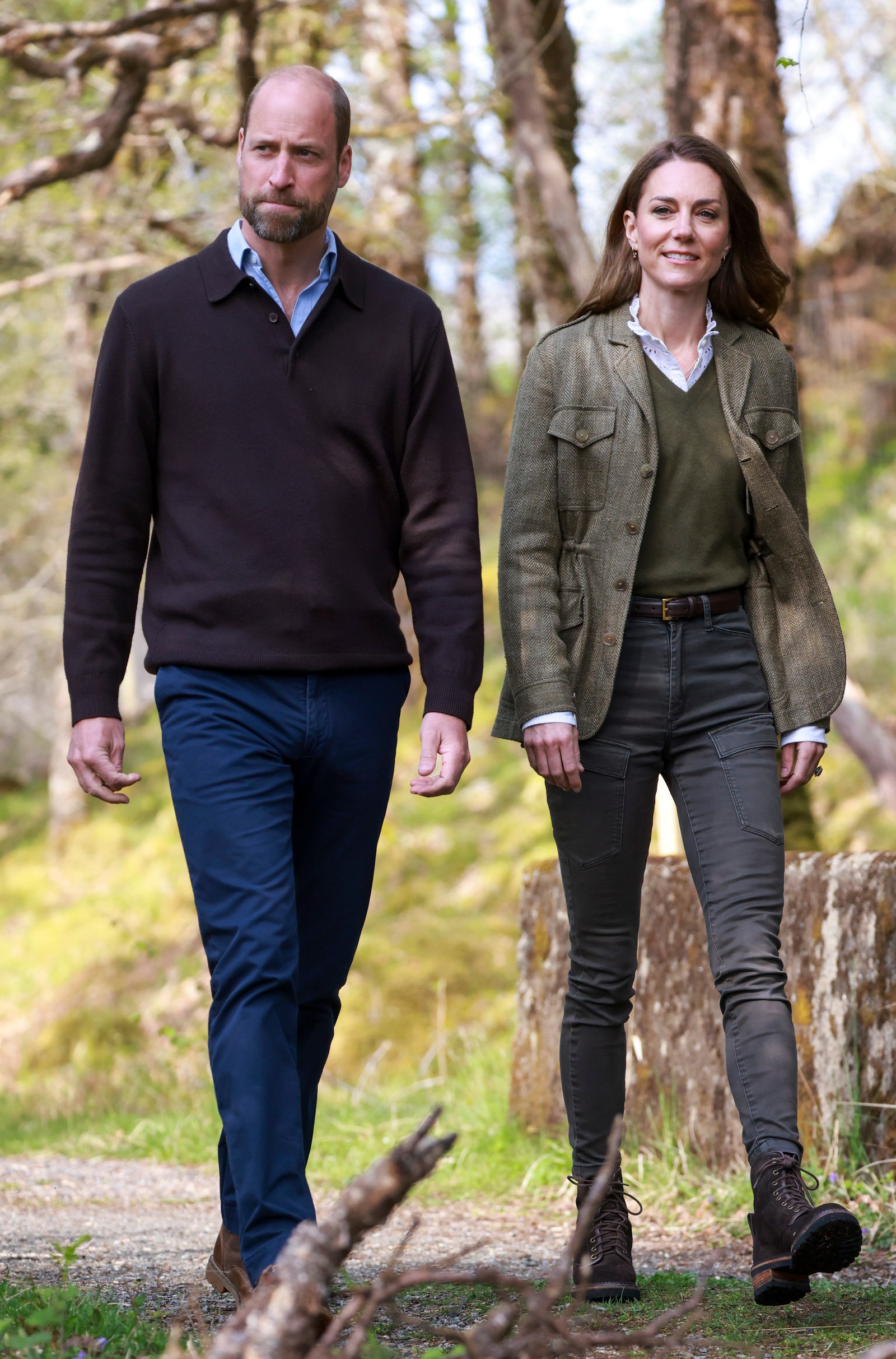 Image may contain Prince William Cambridge clothing pants man walking accessories belt jacket and jacket