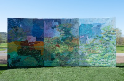 A large sculpture sparsely blue, green and light purple.