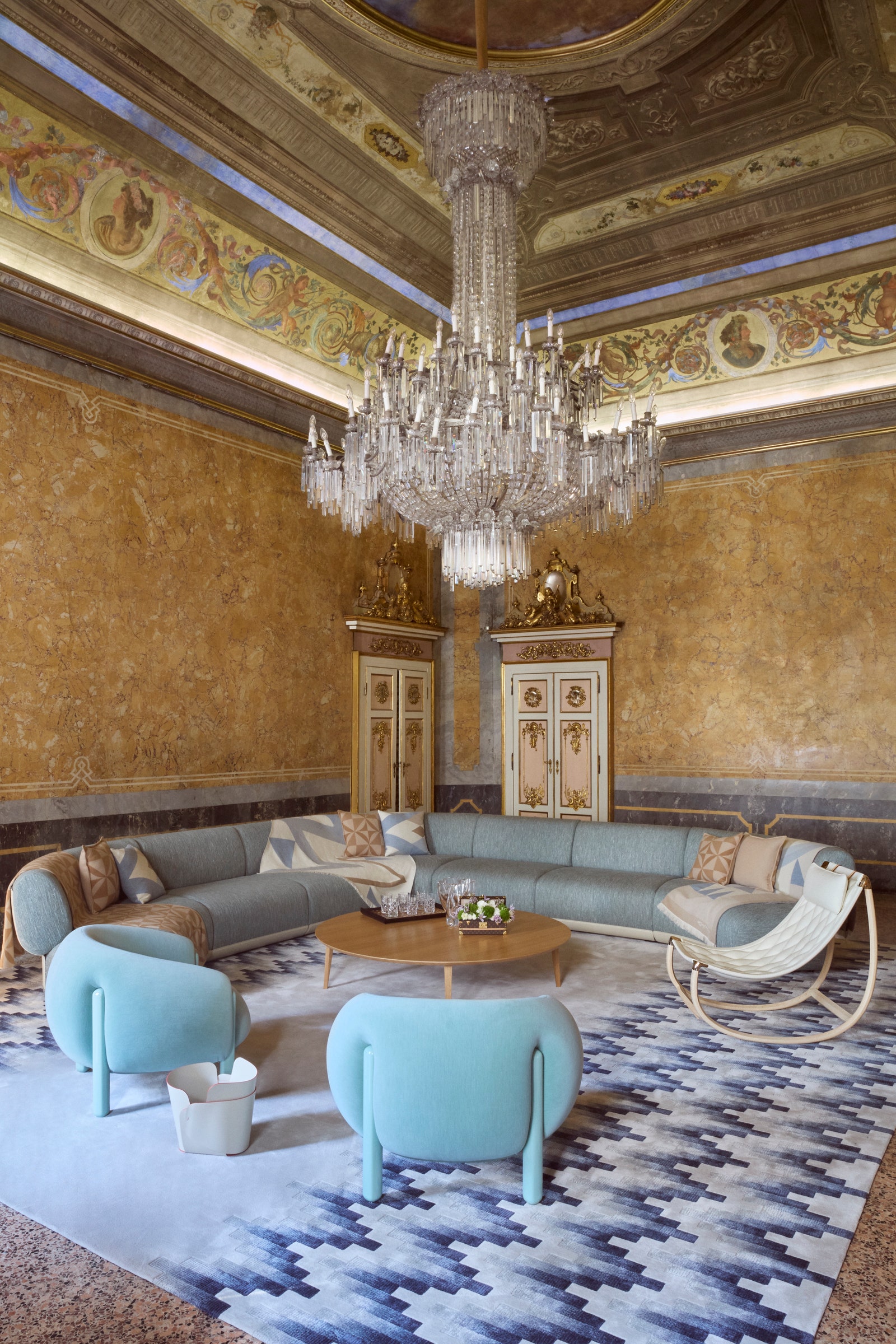 Images may contain chandeliers home decoration architecture dining table furniture and interior