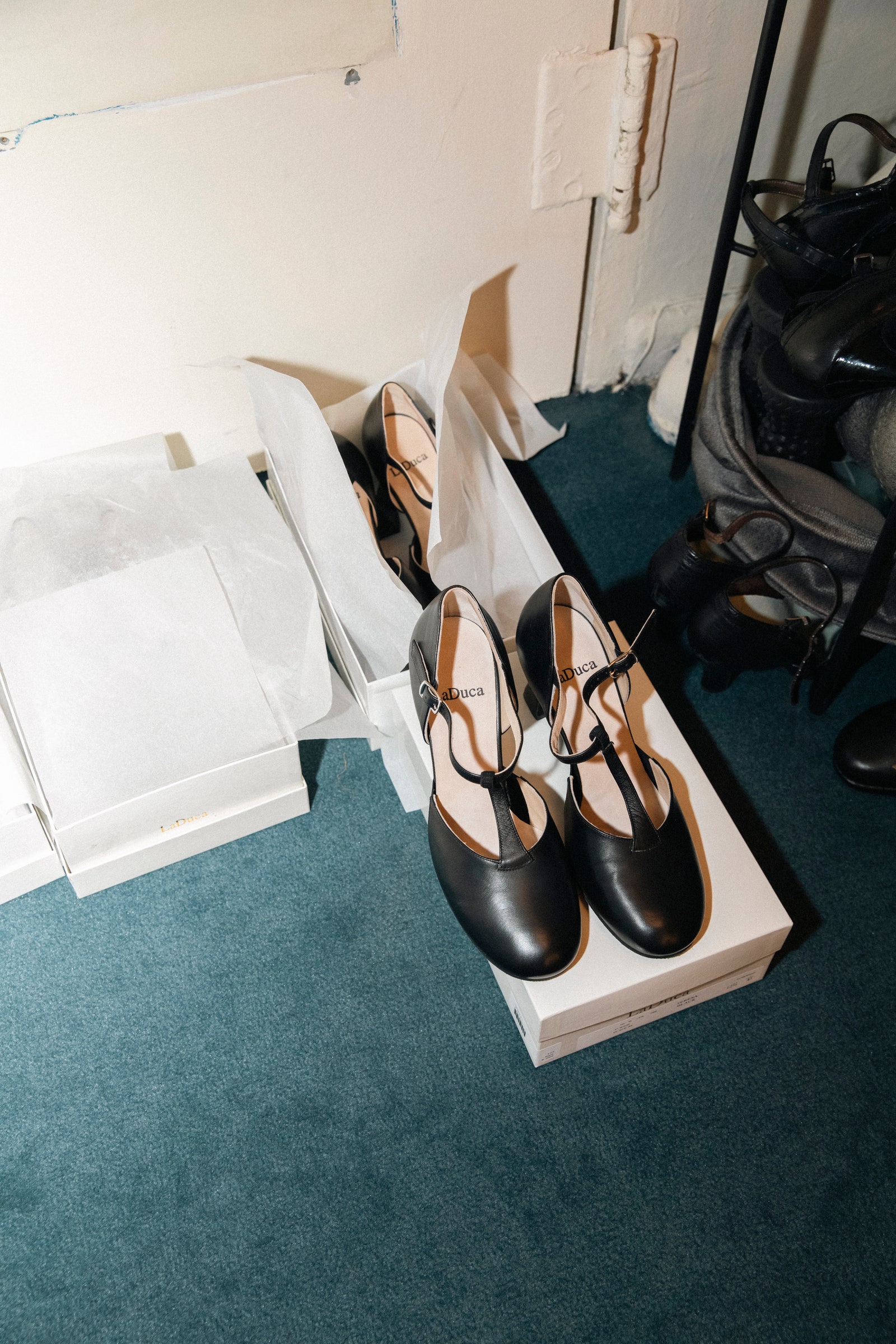 Images may contain clothing, footwear, sandals, high heels, and handbags