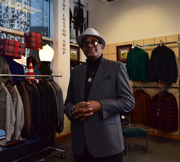 Images may contain Johnnie Johnson's clothing hat formally wearing suit accessories glasses jacket and jacket