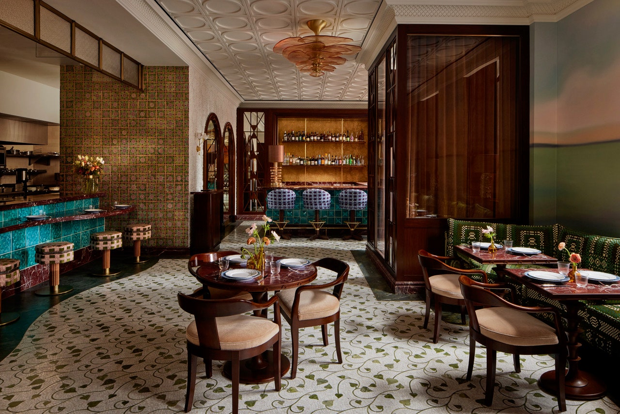 Images may contain architectural dining table furniture indoor dining table and chairs