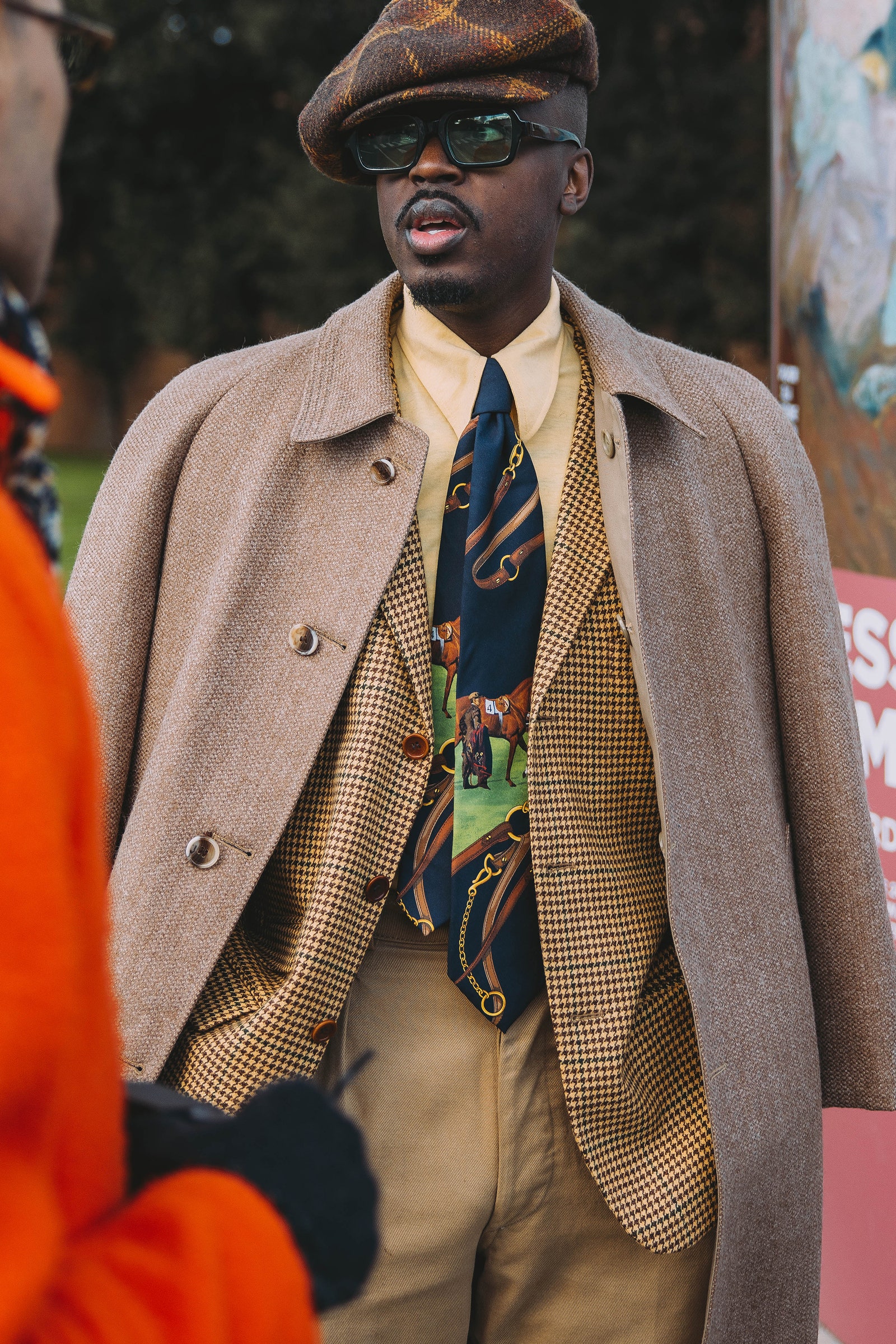 Images may contain Michael Kiessou accessories formally wearing ties coats for adults and glasses
