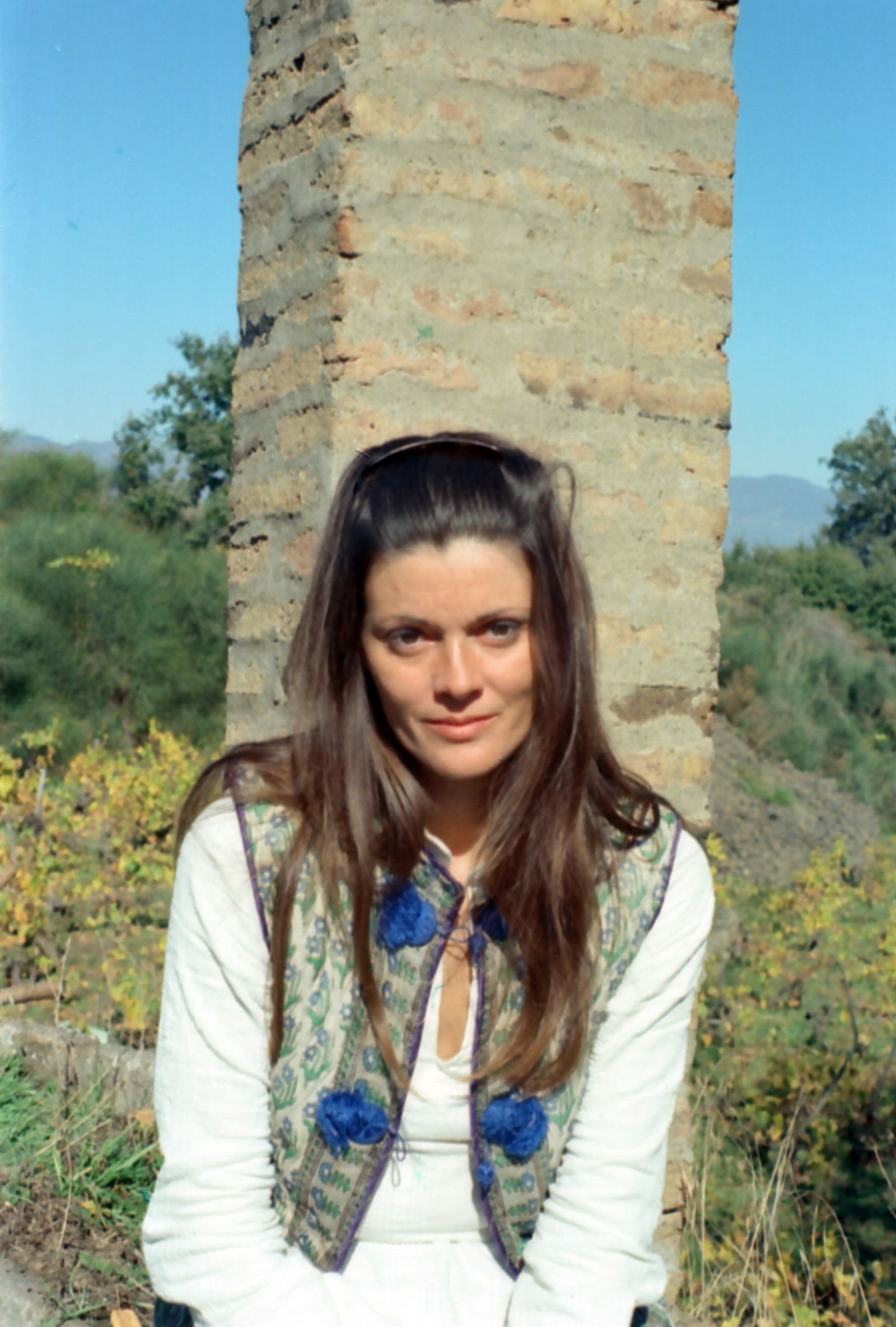 Images may contain Sarah Douglas facial man photography portrait rock plant vegetation tree and grass