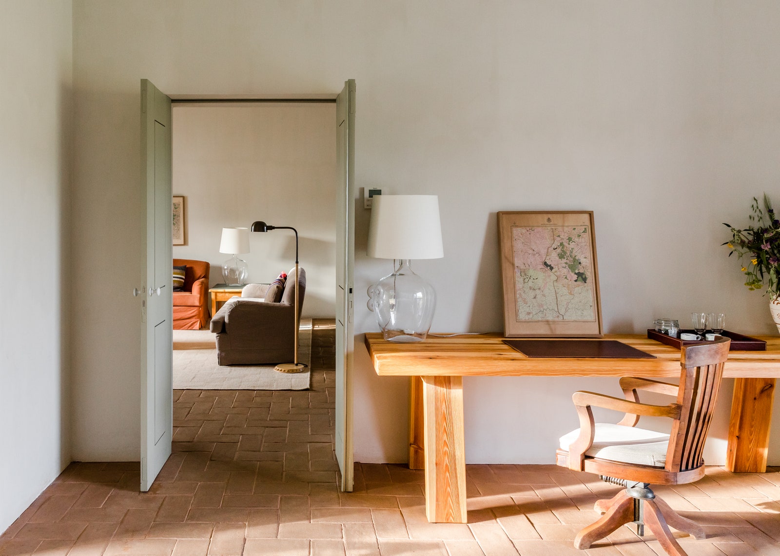 Images may contain corner lights interior design furniture table chair sofa art painting and wood