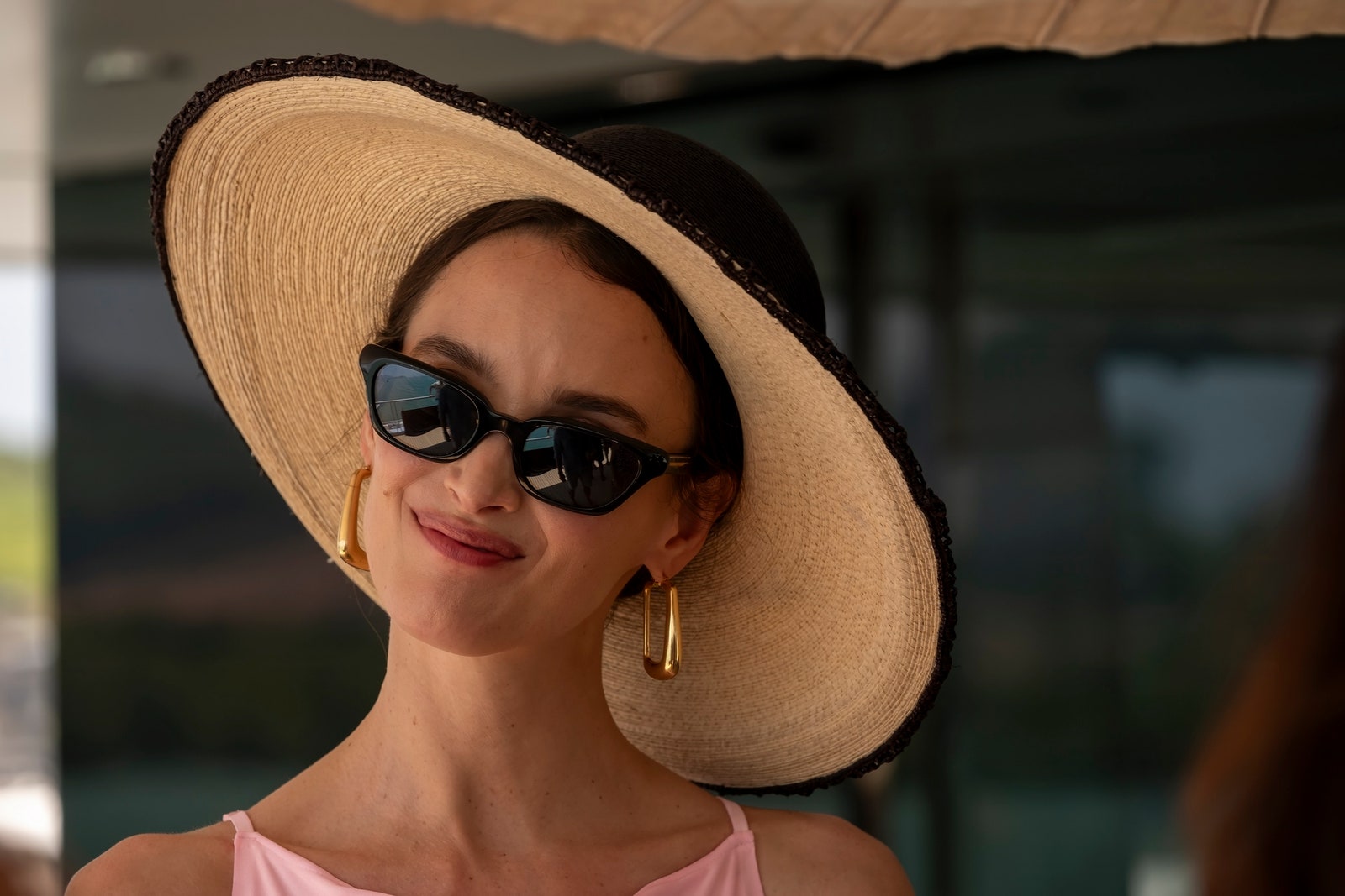 Images may contain Charlotte LeBon. Hat. Sun hat accessories. Glasses. People's face and photography.