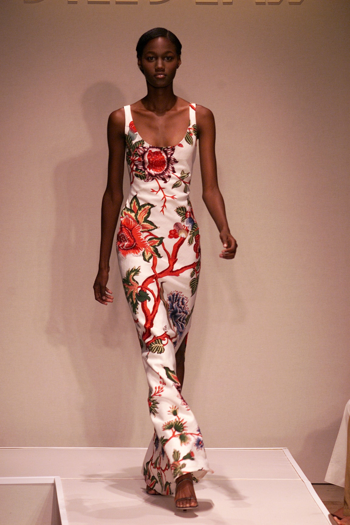 Images may contain formal wear of Gloria Jones clothing in formal fashion adult dress footwear high heels and shoes