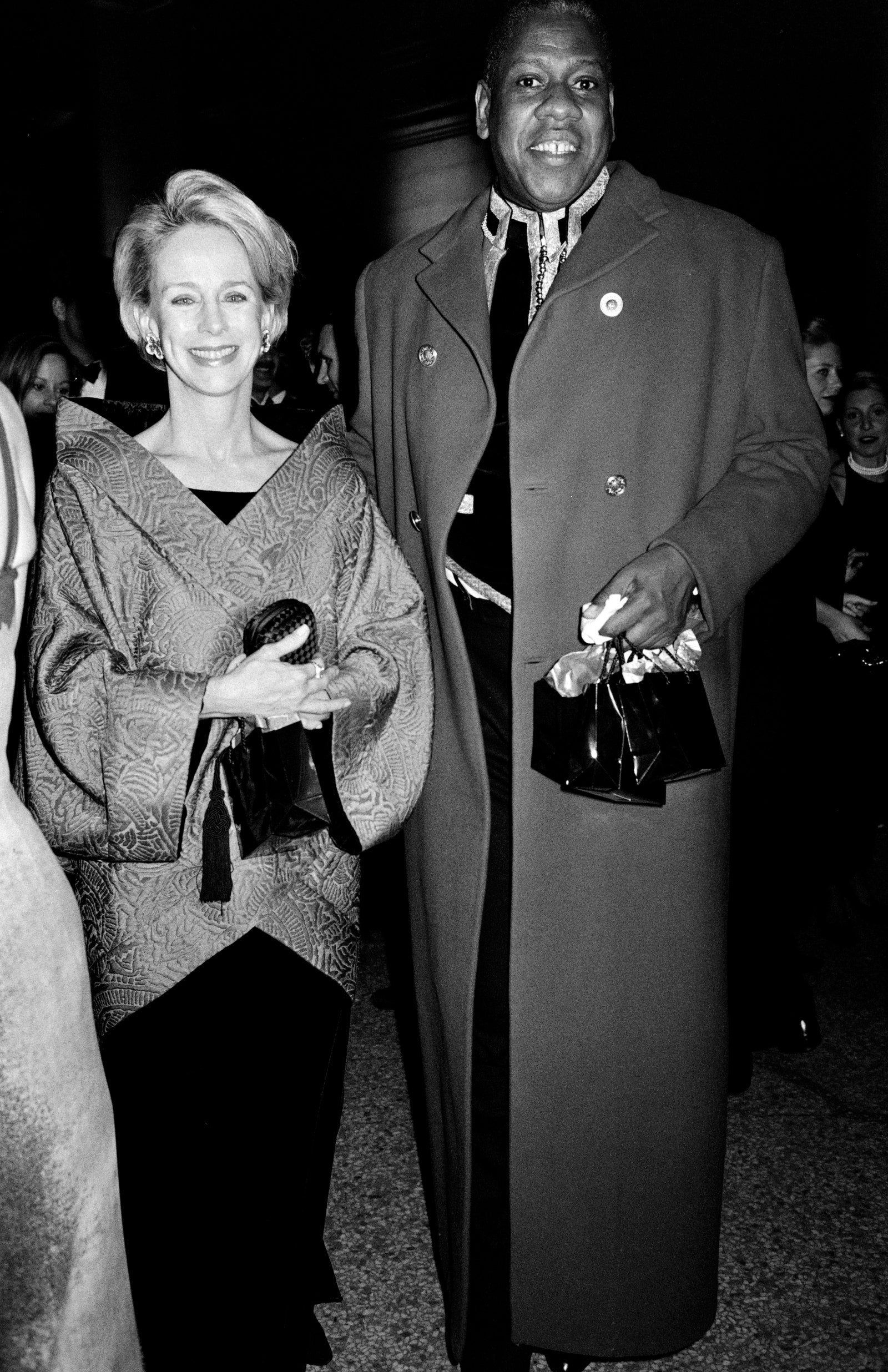 Images may contain Andr Leon Talley Clothing Jacket Accessories Bag Tote Bag Adult Wallet Coat and Face