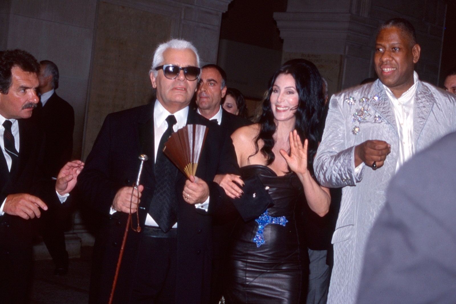 Images may contain Karl Lagerfeld Andr Leon Talley Cher Rajiv Gandhi Gandhi Gandhi Clothing Jacket and Formal