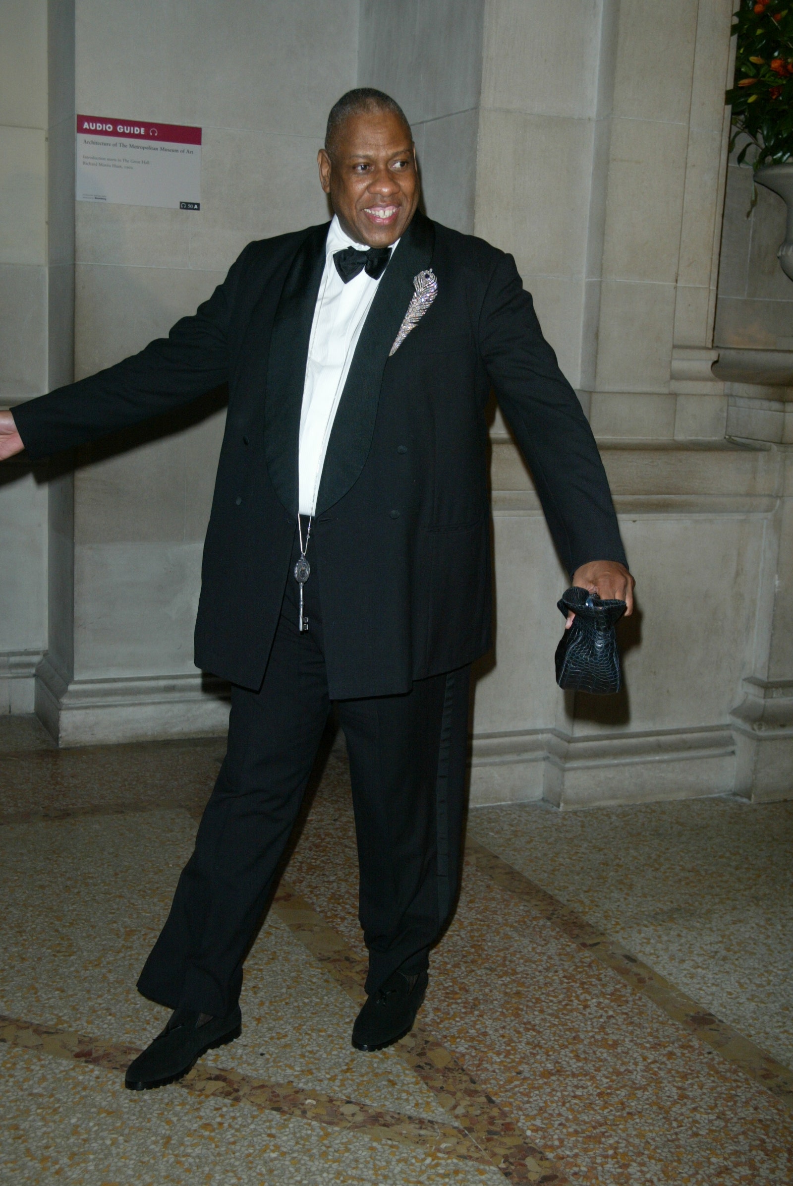 Images may contain Andr Leon Talley outfit formally wearing suit tuxedo jacket and tie