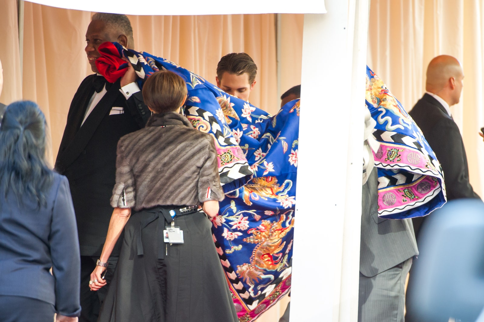 Images may contain Andr Leon Talley formally dressed in fashion dress adult suit and watch