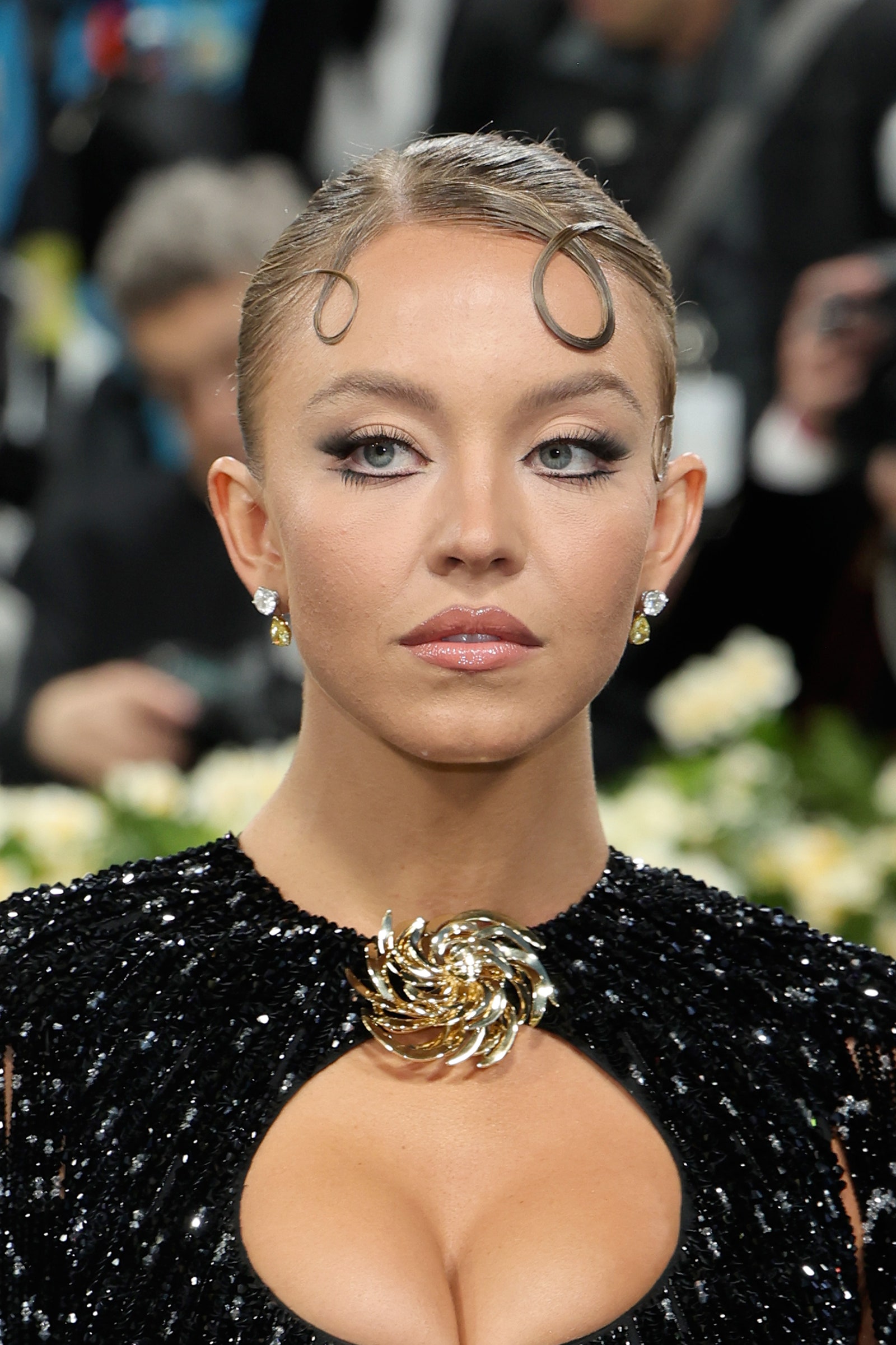 Images may contain Sydney Sweeney adult blonde accessories jewelry and necklace
