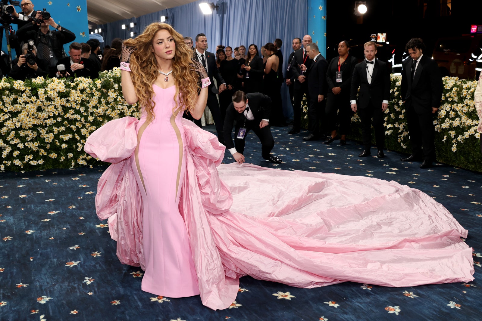 Images may contain Shakira clothing dress formally wearing fashionable dress adult accessories jewelry and necklace
