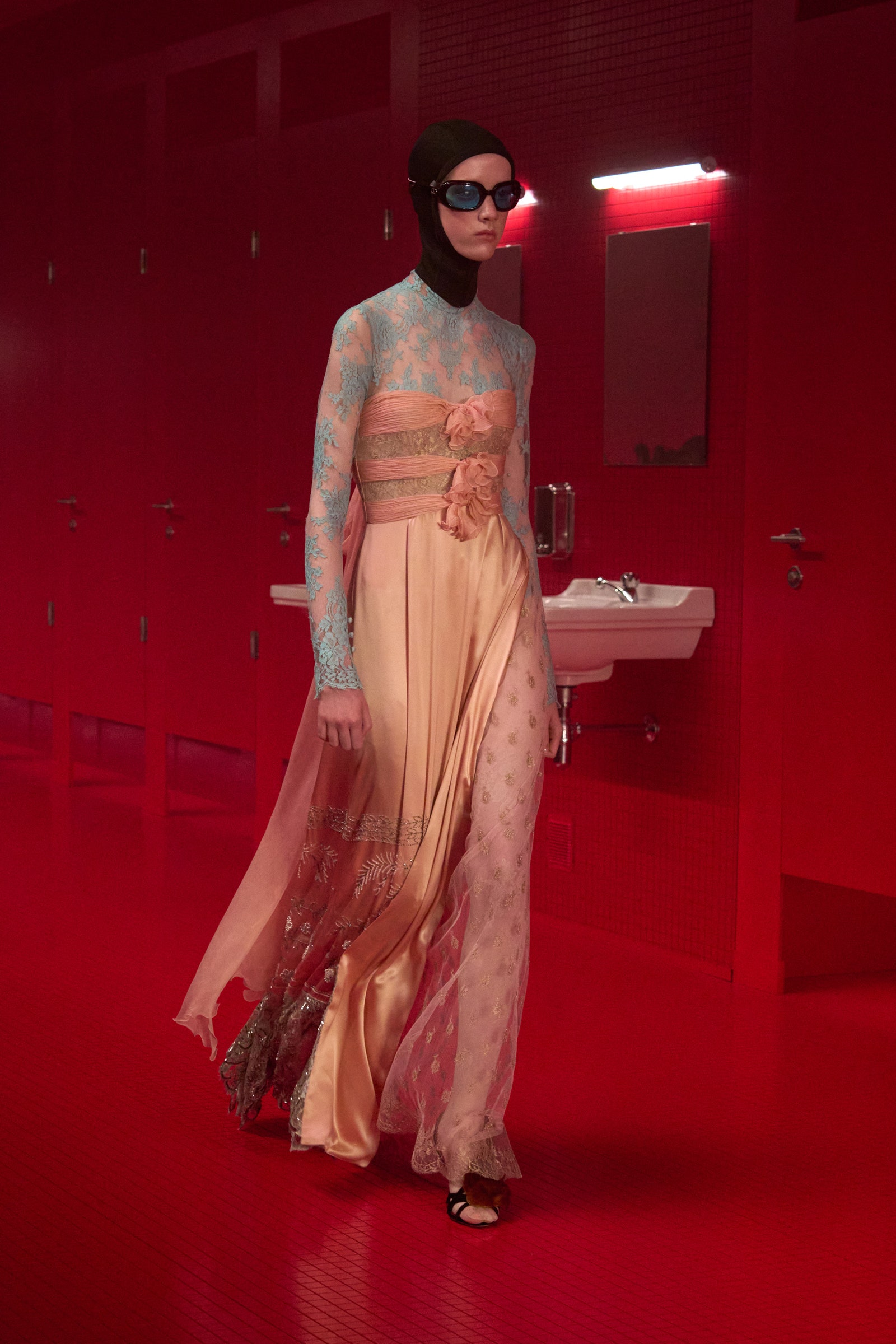 Images may contain stylish clothing gown evening dress formally wearing dress sink faucet staff and accessories
