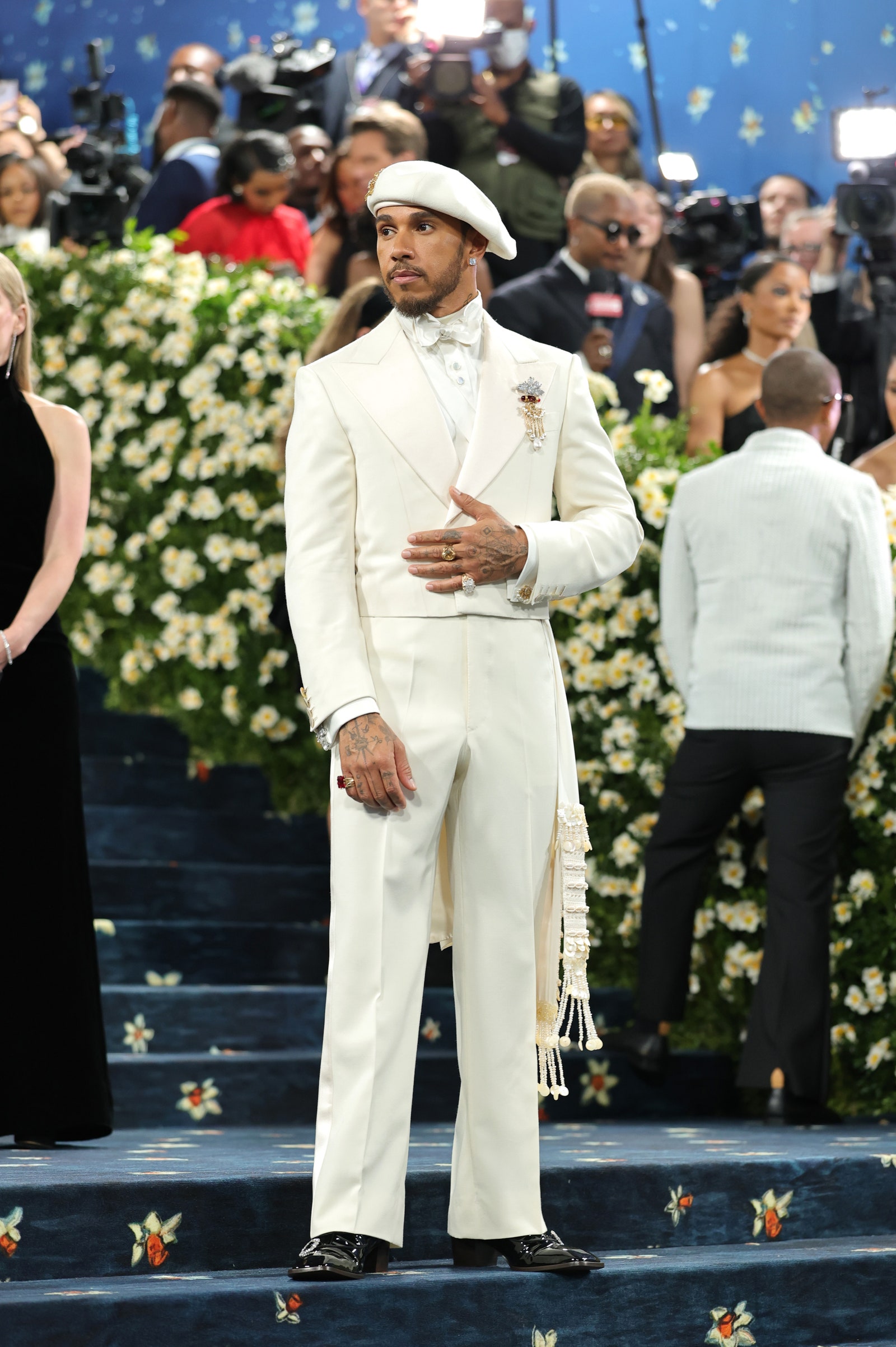 Images may contain Lewis Hamilton Zuri Hall Zygmunt Staszczyk men's clothing hat shoes and adults