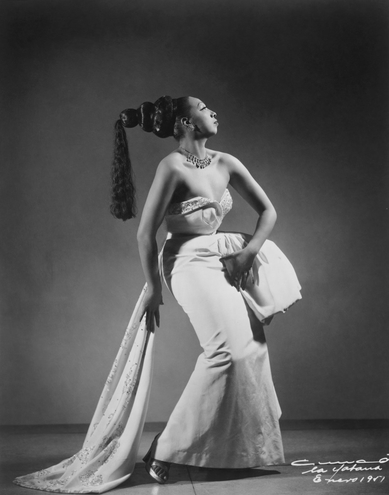Images may contain Josephine Baker clothing dress adult formally wearing dance casual activities and fashion