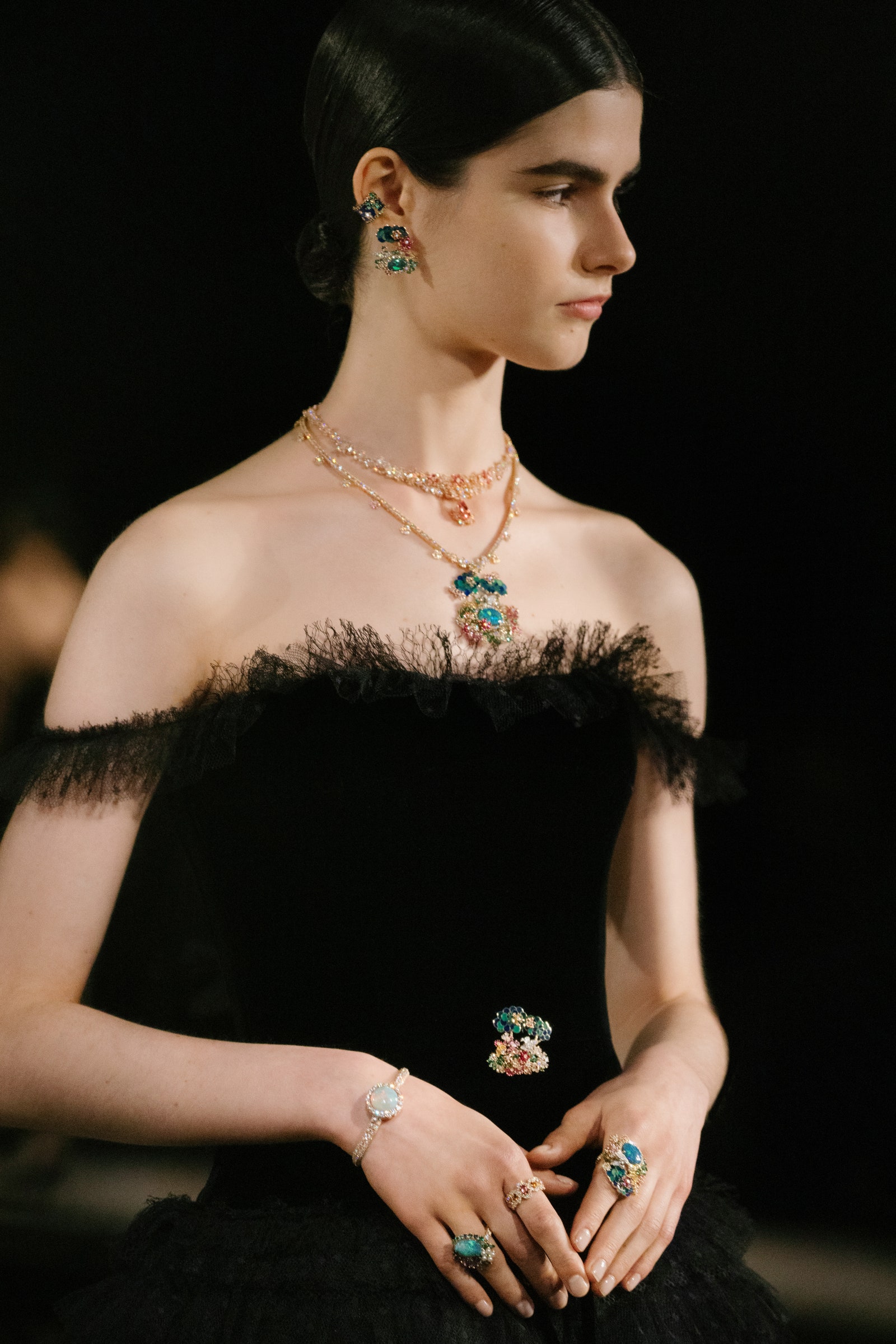 Images may contain adult accessories jewelry ring clothing necklace bracelet formal wear and body parts