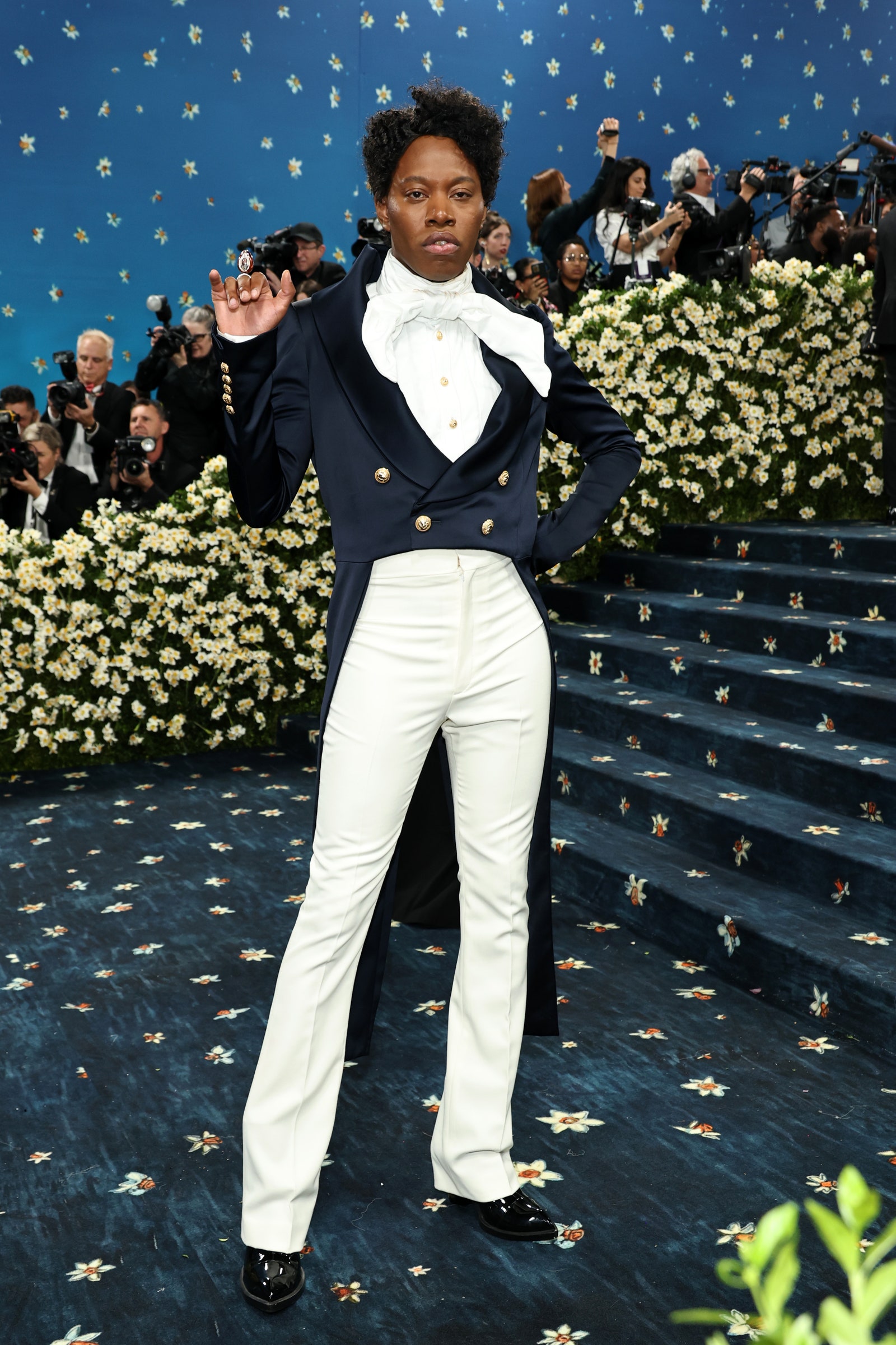 Images may contain blazer jackets shoes adult formal wear suit photography and face