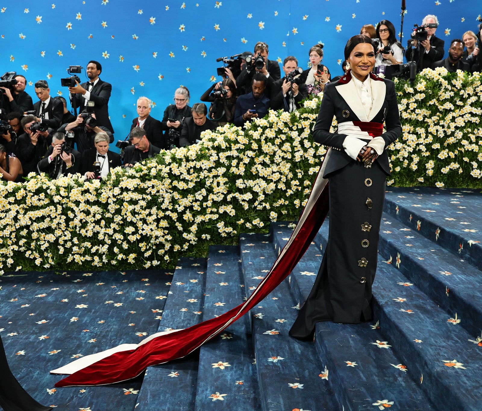 Images may contain Mindy Kaling Marcus Douthit Mike Kelly MũKomawangũgĩRobertLegato Osman Ghazi and adult