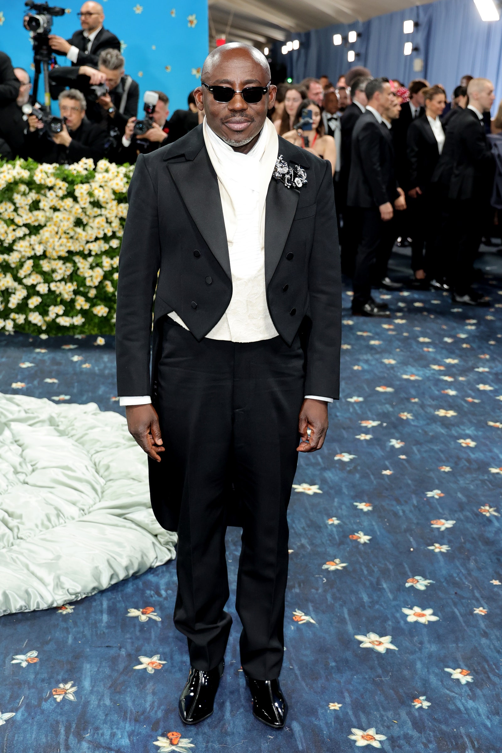 Images may contain Edward Enninful Jonathan Teplitzky Kimberly Hill Stand-up Clothing and Suit