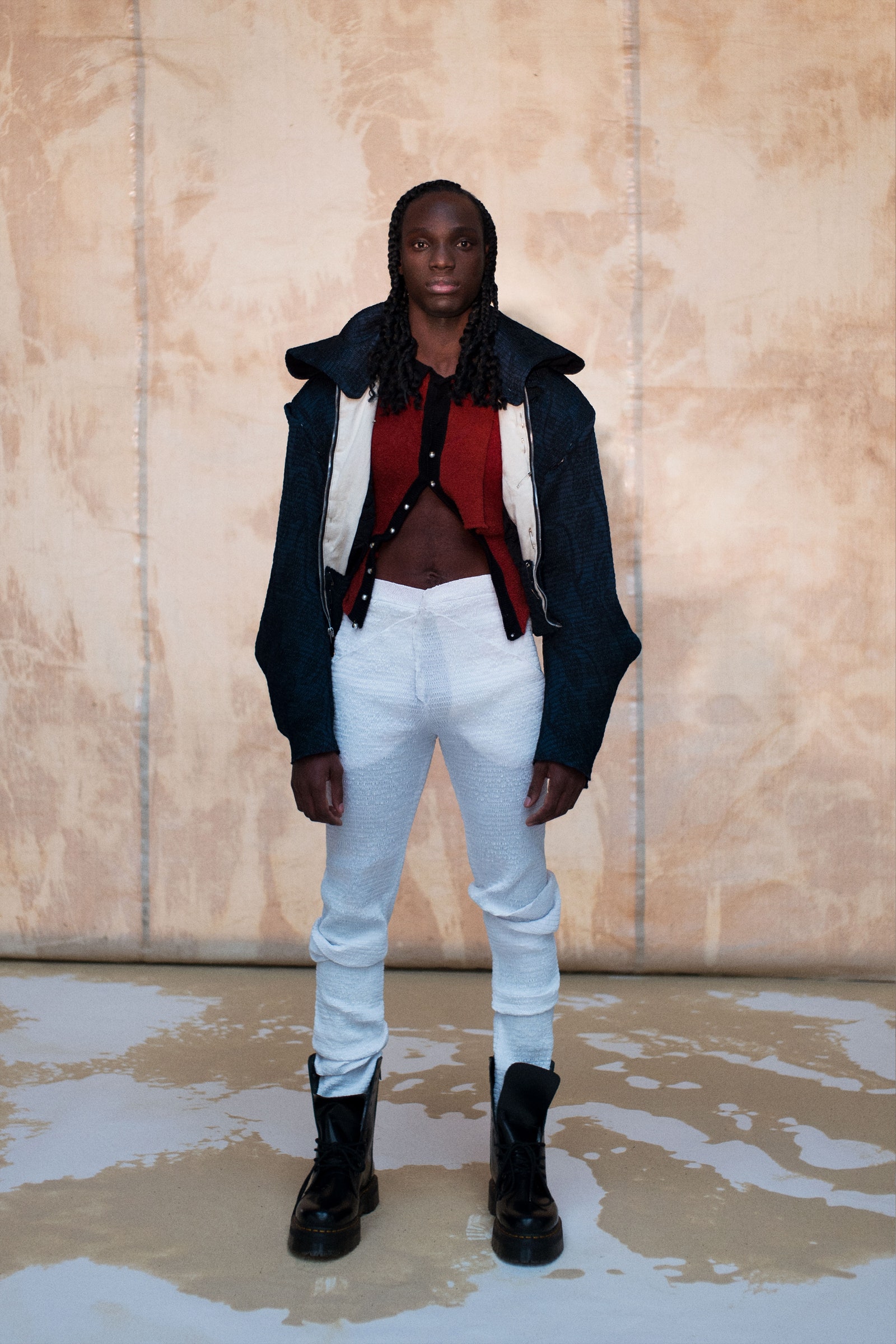 Images may contain clothing clothing personnel blazer coat shoes and shoes