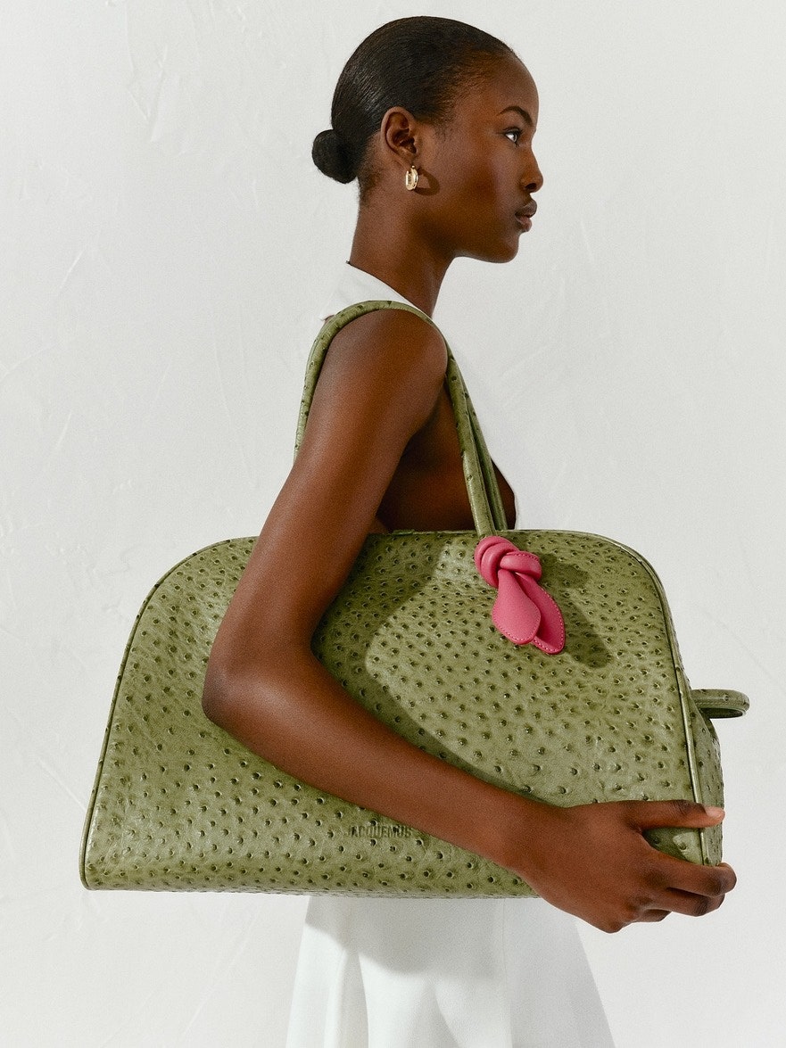 Images may contain accessories tote wallet and personnel