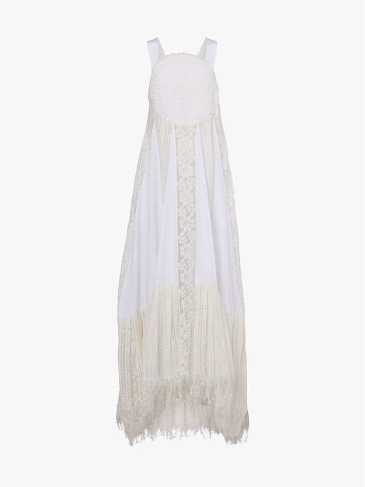 Images may contain: clothing, dresses, fashion, formal wear, dresses, shawls, home decoration, adults, people, wedding dresses and wedding dresses