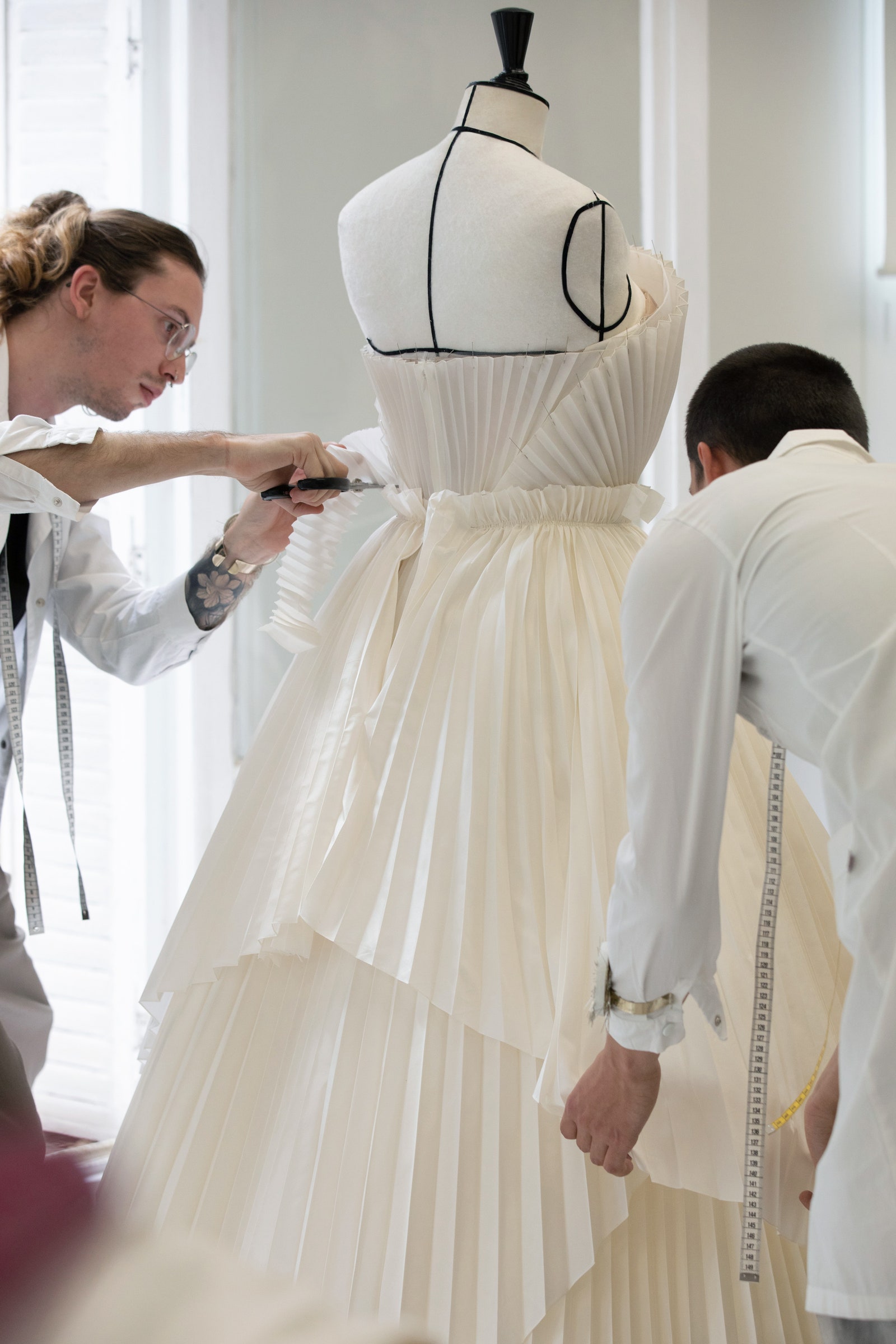 Images may contain clothing dress formally wearing fashionable dress wedding dress adult and evening dress
