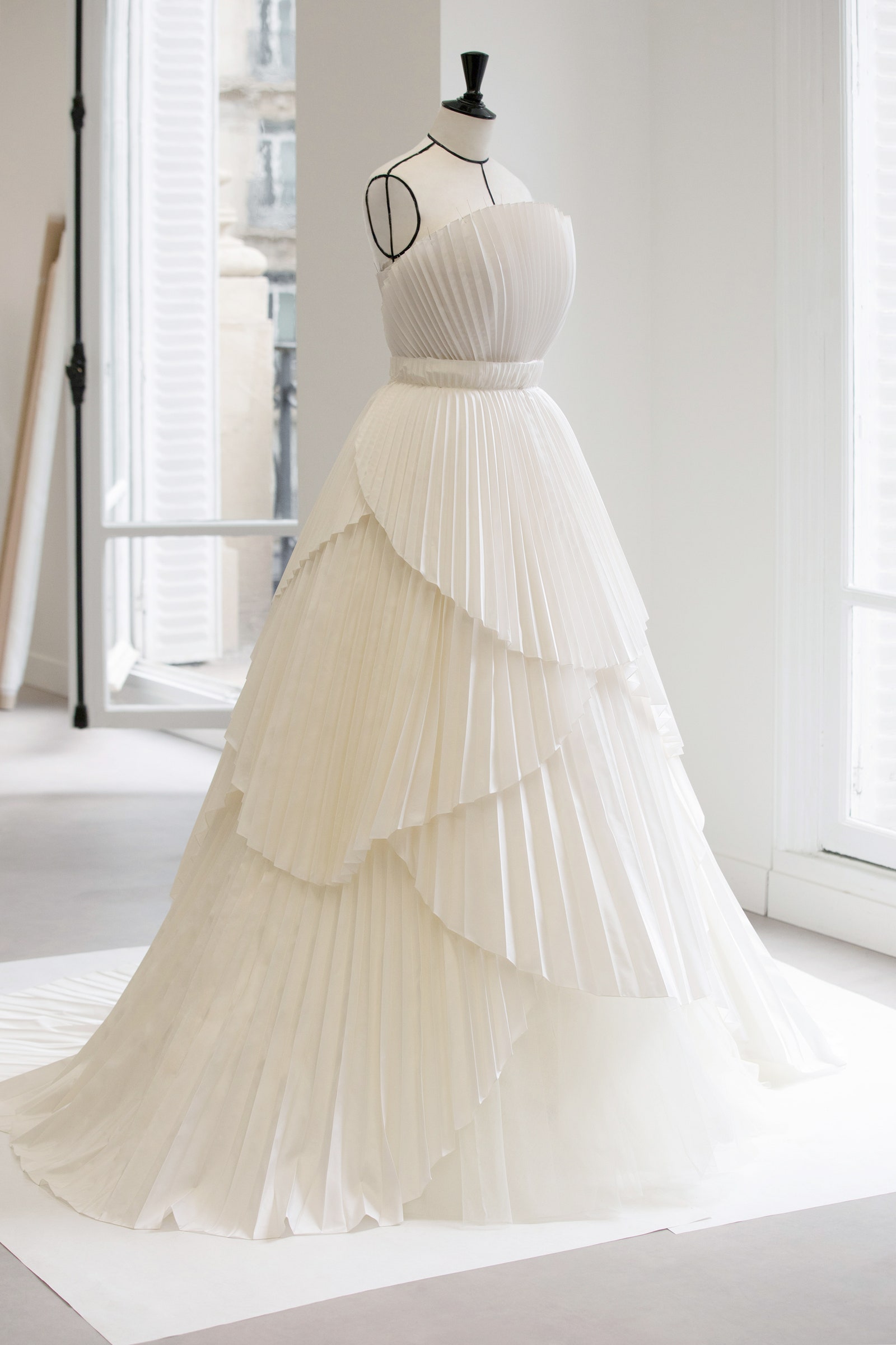 Images may contain clothing stylish formal wear dress wedding and wedding dress