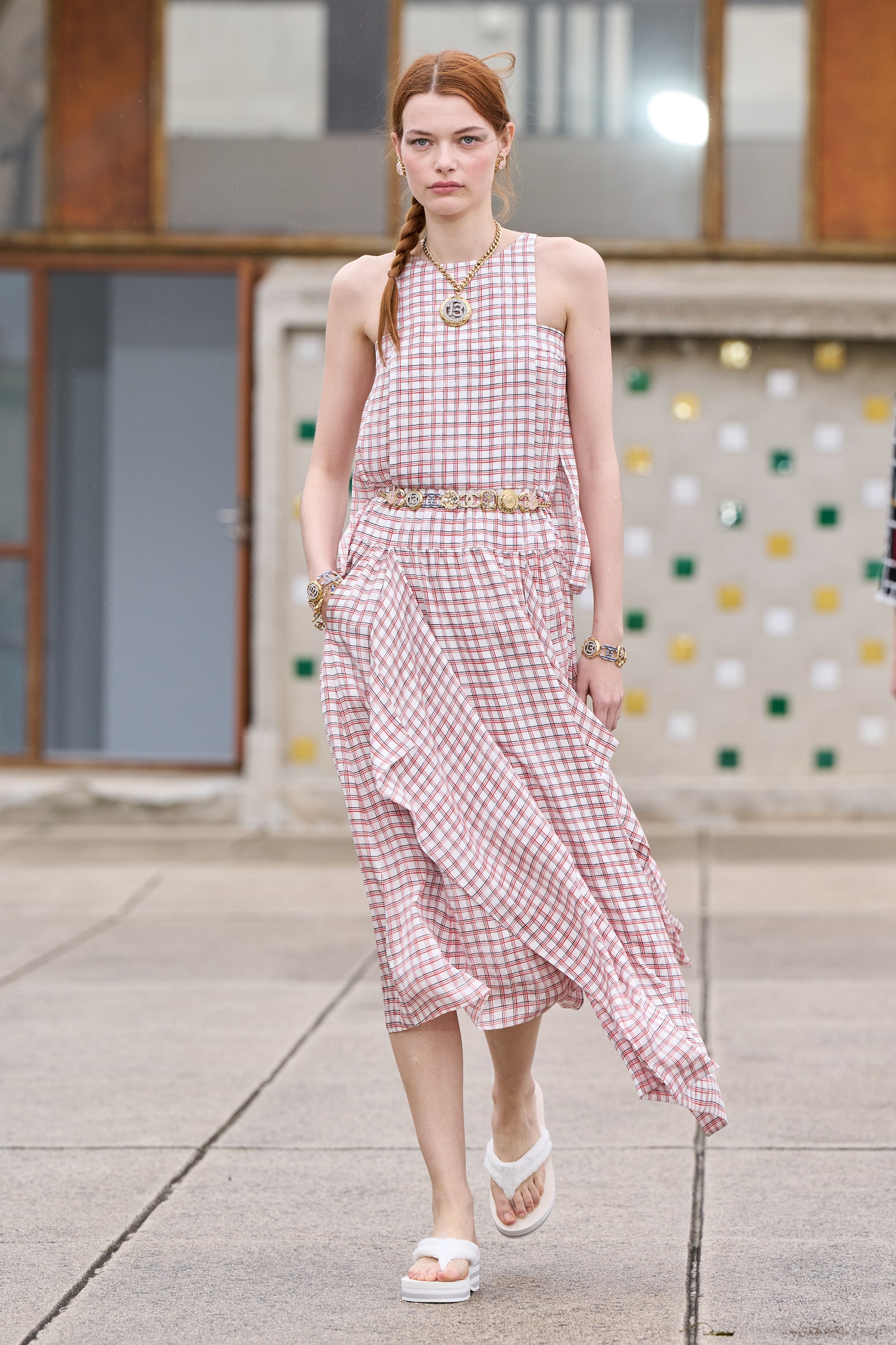 Images may contain clothing accessories jewelry necklace watch formally wearing footwear and sandals