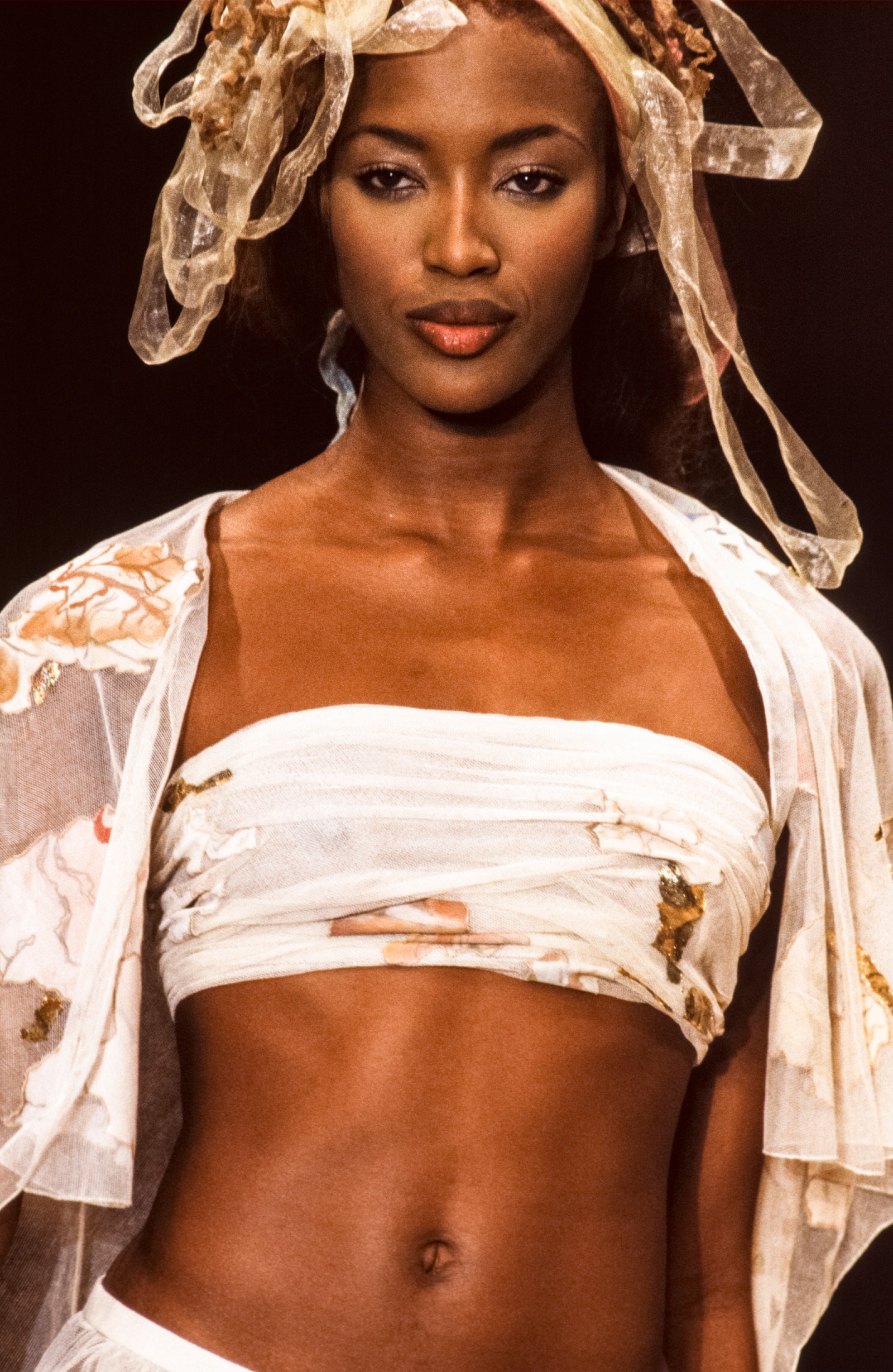 Images may contain Naomi Campbell adult facial photography portrait skin and fashion